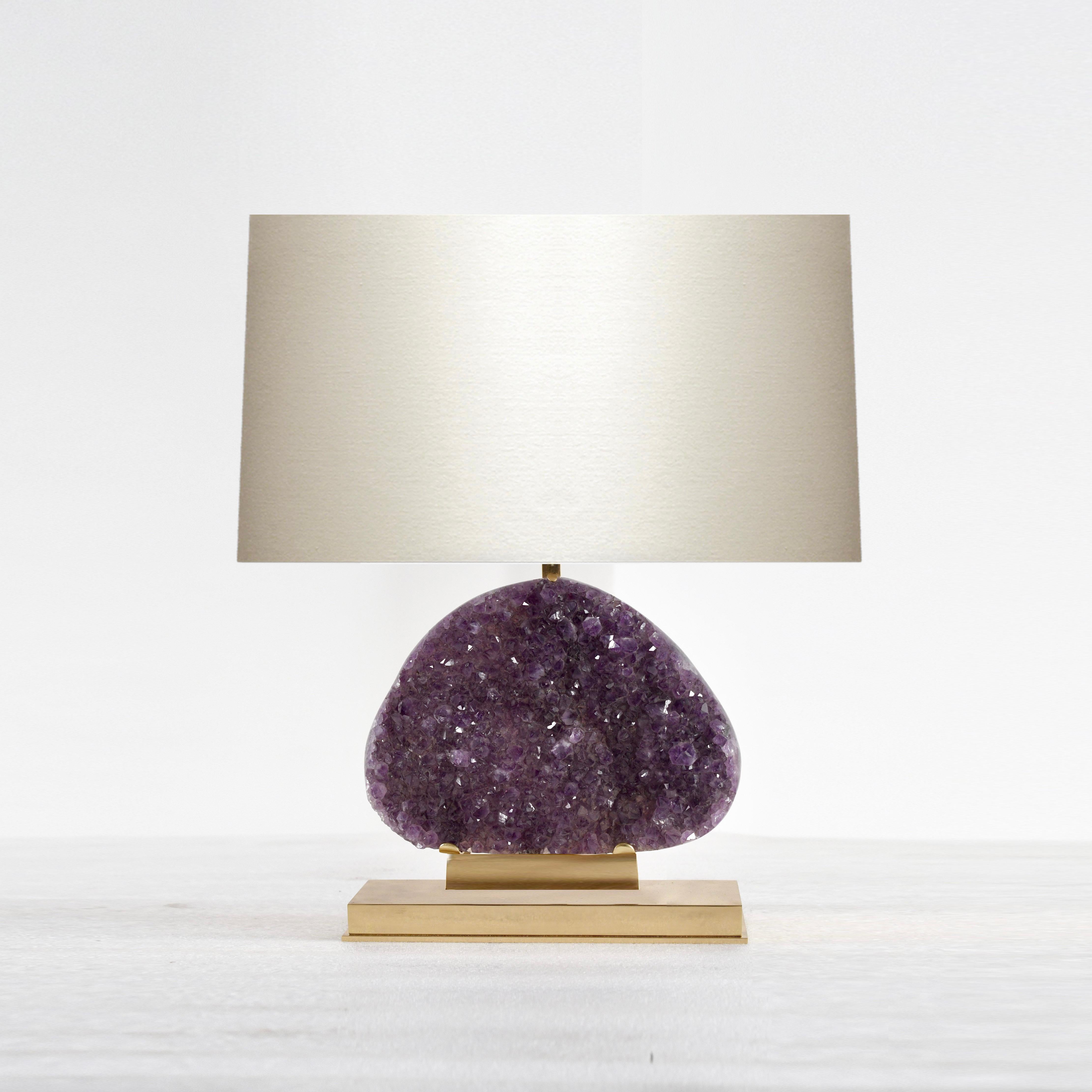 Amethyst geode cluster lamps. Mount is the lamp and the base is polished brass. Created by Phoenix Gallery NYC.
Top of the agate 11.5