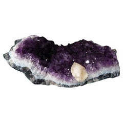 Amethyst geode with calcite