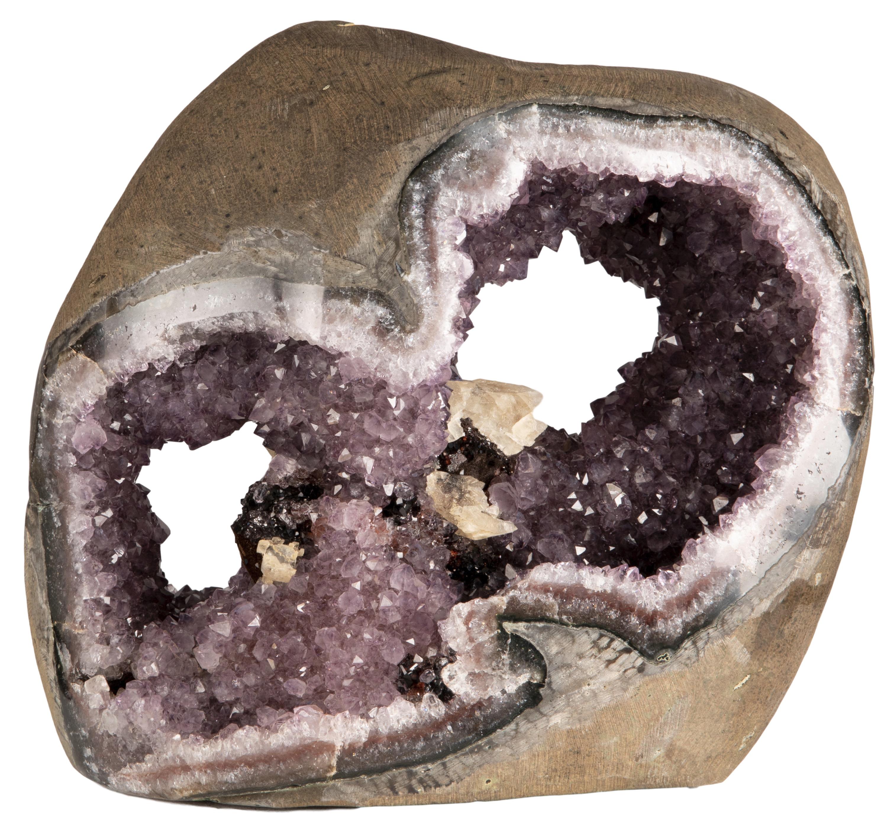 Amethyst Geode with Several Mineral Crystal Formations Inside In Excellent Condition For Sale In London, GB