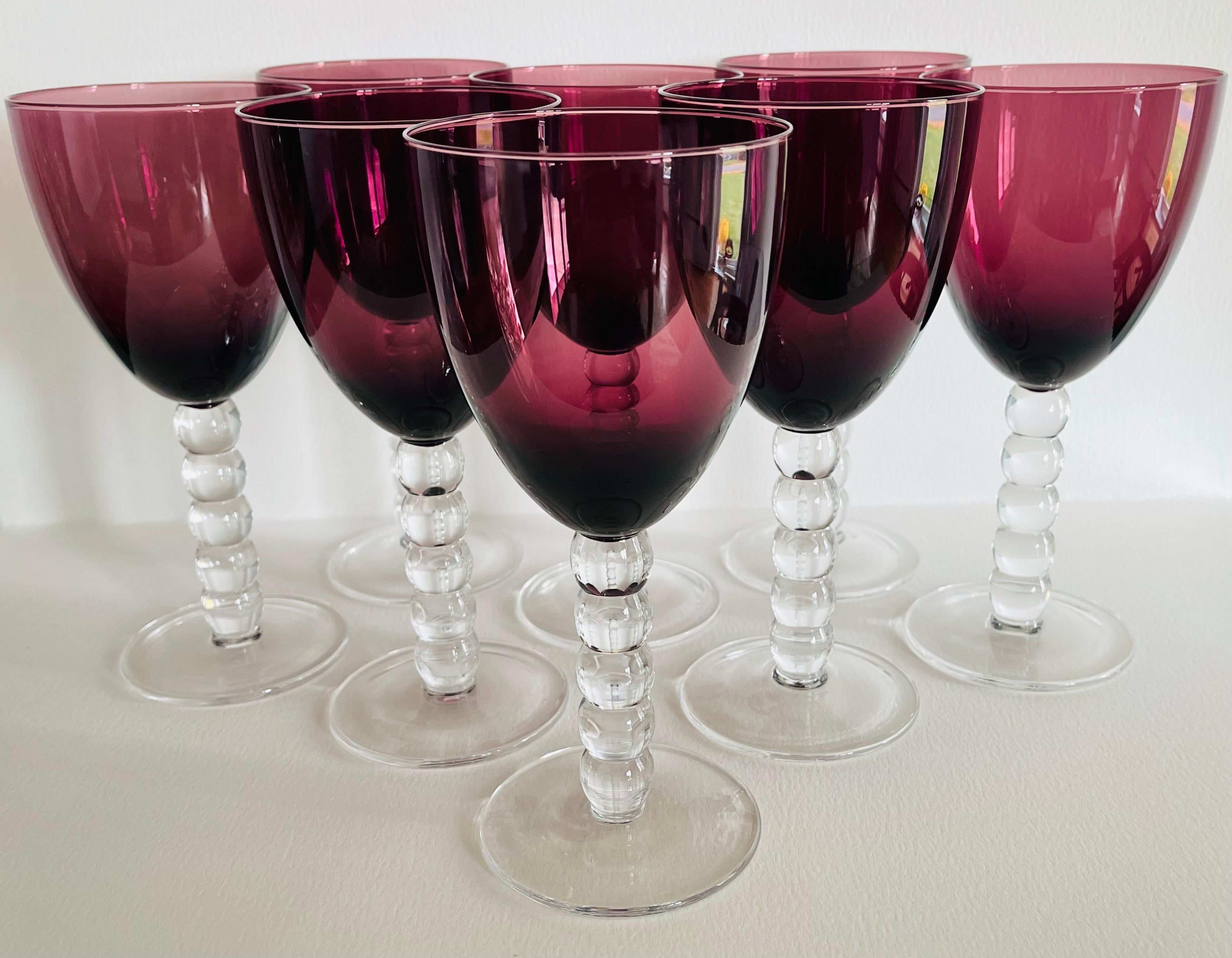 Vintage 1980s set of eight amethyst glass wines with clear bubble stems. No marks.