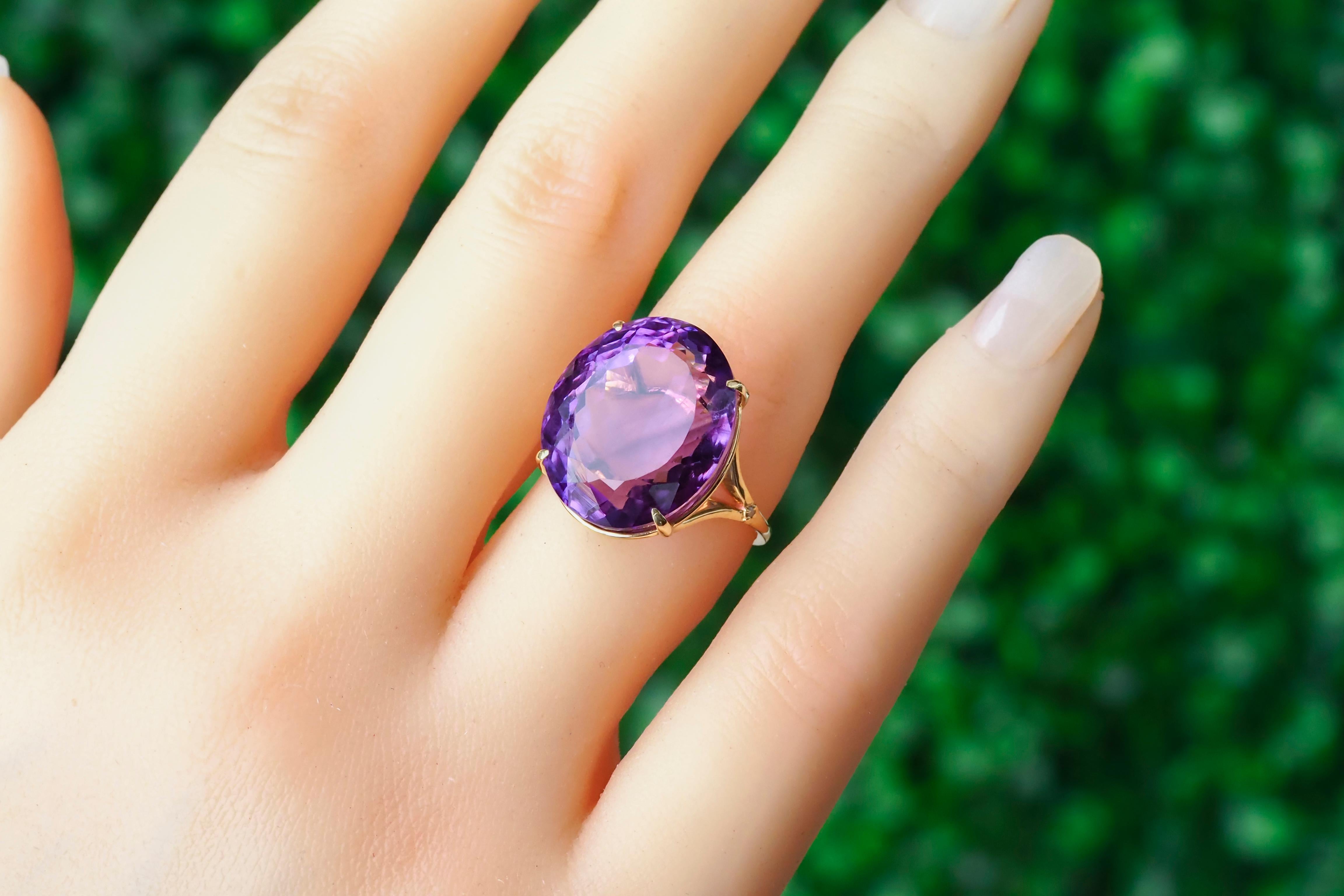 Metal type: Gold
Metal stamp: 14k Gold
Weight: 4.5 g. depends from size

Gemstones 

Set with amethyst, color violet
Oval cut, aprx 10 ct
Clarity: Transparent with inclusions (color lines)

Other stones

2 diamonds 0.01x2=0.02 ct (F/VS), round