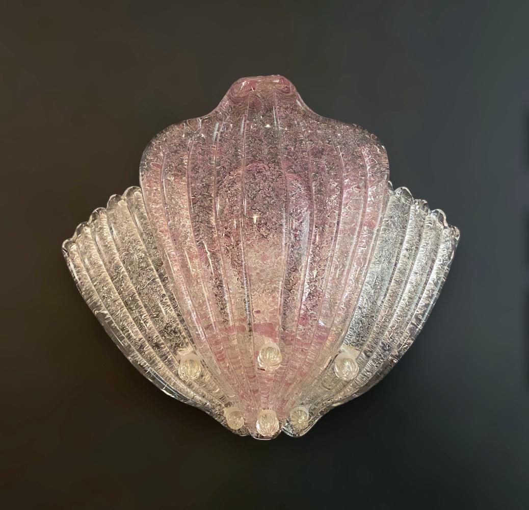 Vintage Italian Murano glass wall lights with hand blown clear and amethyst graniglia to produce granular textured effect / Made in Italy in the style of Barovier e Toso, circa 1960s
Measures: height 12 inches, width 16 inches, depth 5 inches
1