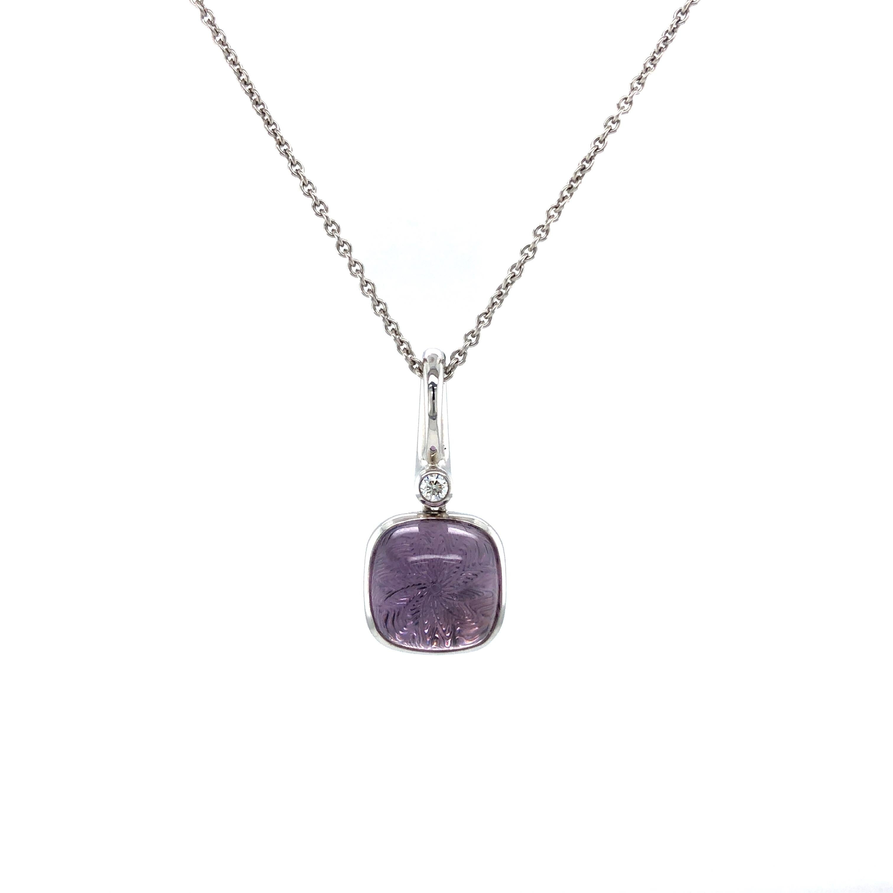 Victor Mayer square shaped pendant 18k white gold, Era Collection, 1 diamond 0.04 ct, G VS, 1 amethyst cabochon, 18k guilloche disc

About the creator Victor Mayer
Victor Mayer is internationally renowned for elegant timeless designs and unrivalled