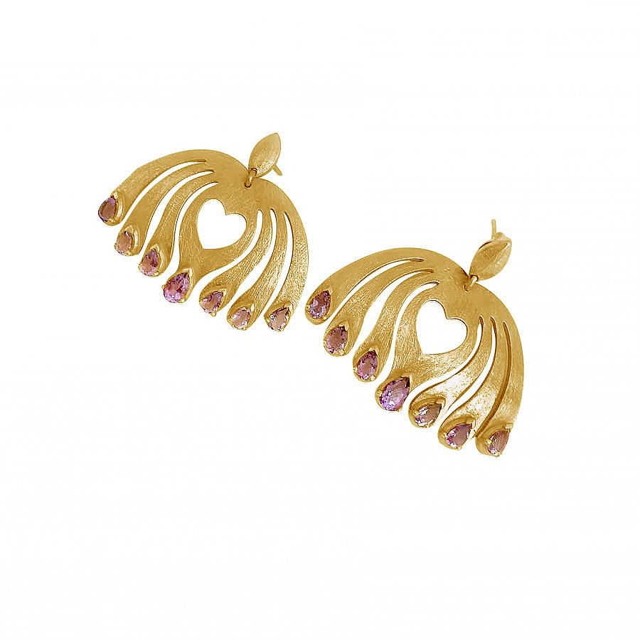 Peacocks symbolize honor and royalty, making their impressive presence known with their confident showcase of shimmering feathers. A cut-out heart in the middle of each earring denotes selflove. Seven amethyst gemstones dot the feathers symbolizing