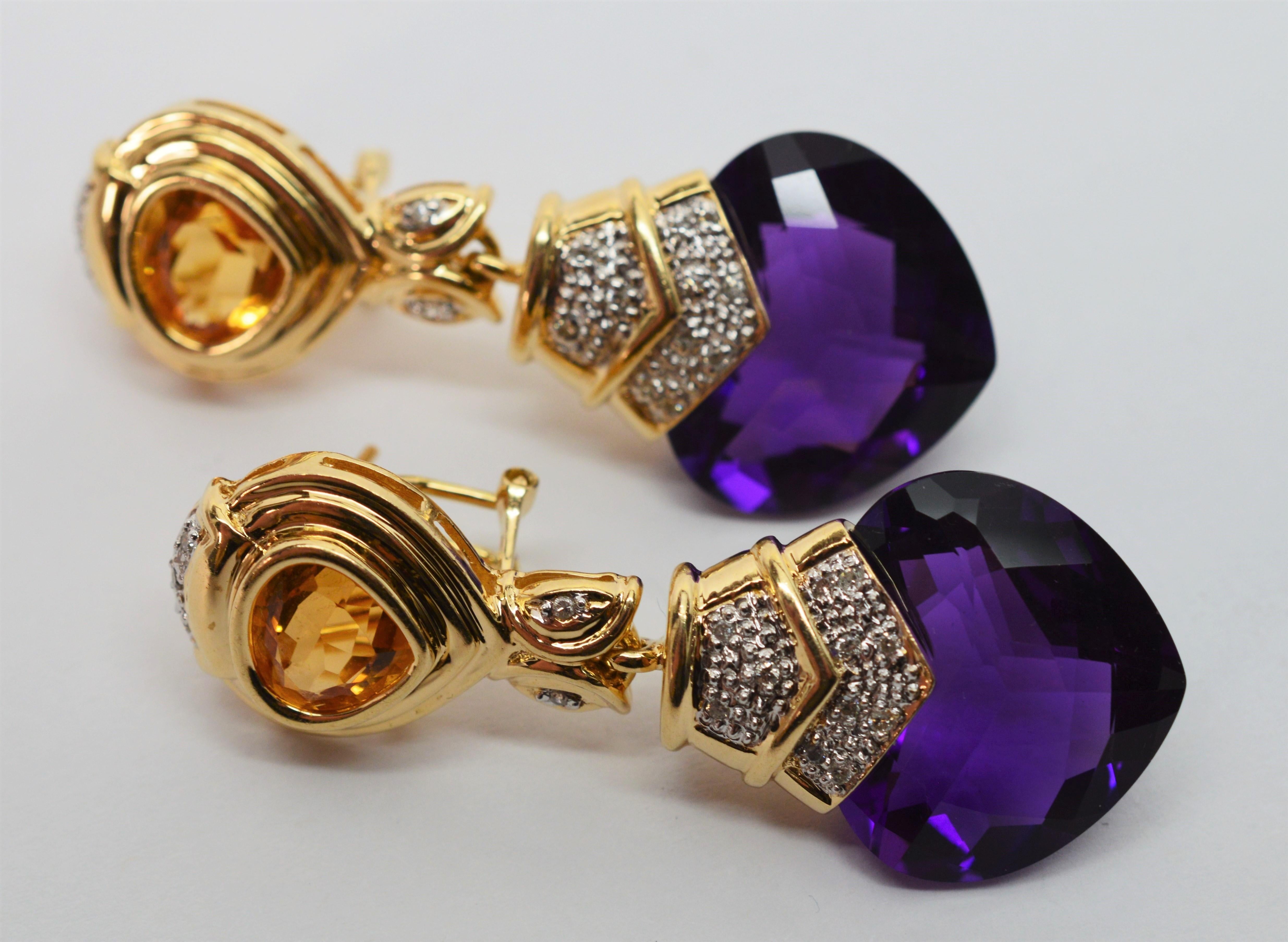 Regally bold in color and charmingly romantic in style, dropping from complimenting yellow citrine diamond accented studs in fourteen karat 14K yellow gold are spectacular 20 carat vibrant purple heart shaped faceted amethyst, 40 carat total weight.