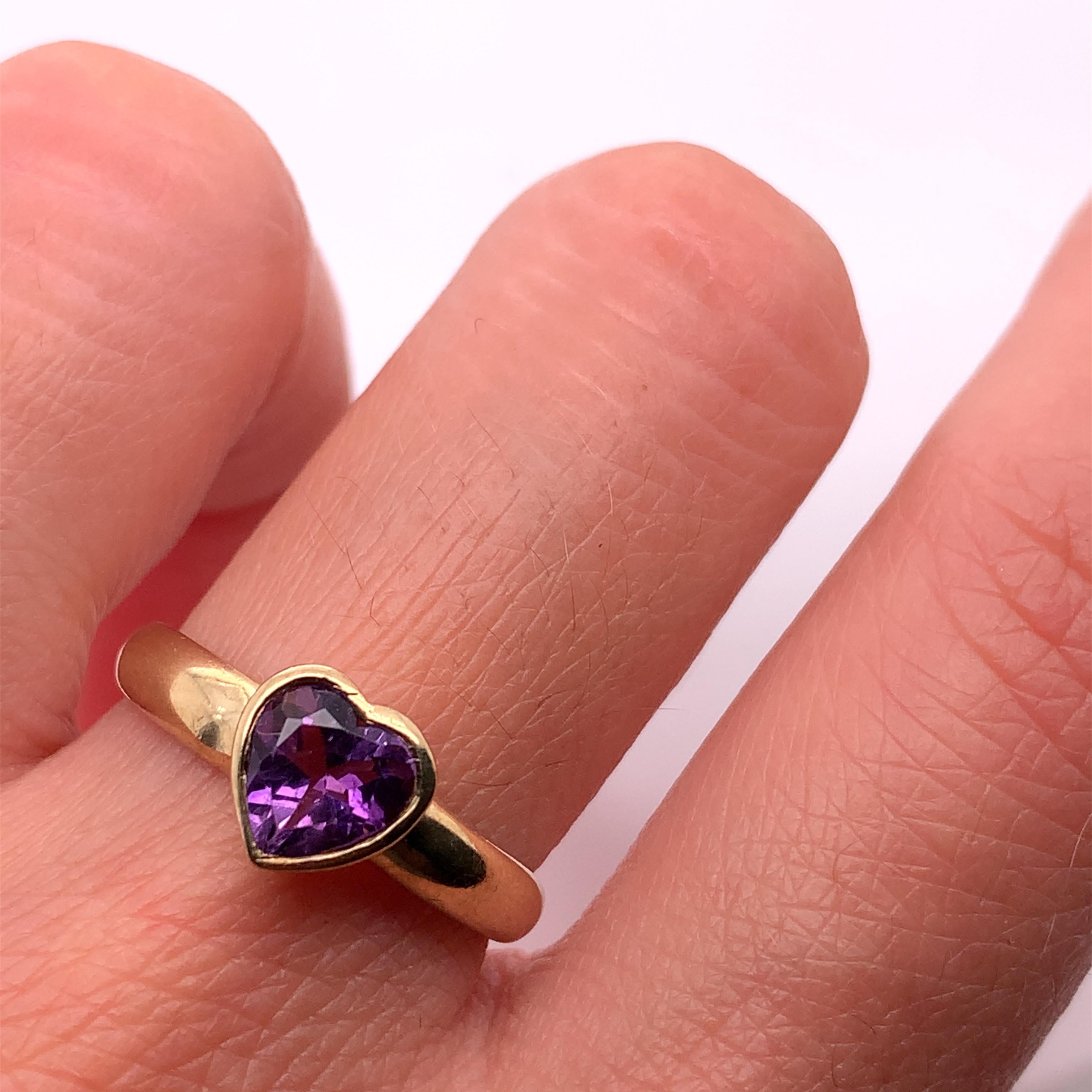 This beautiful ring features a stunning 1.00ct amethyst heart solitaire engagement design, crafted with 9ct yellow gold. The amethyst stone is a natural creation with excellent cut grade and light coloured diamond intensity. 

Amethyst antique