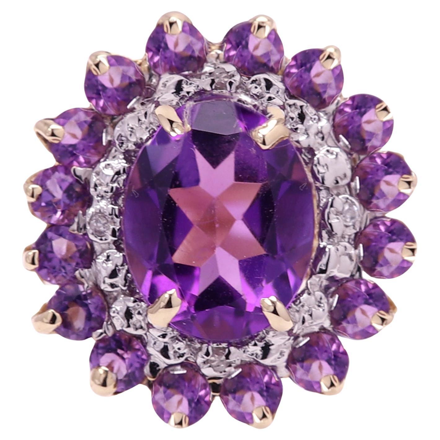 Brilliant Vintage Cocktail ring with a large Amethyst Oval Center 
had previous owner, as- new condition.
10k Yellow Gold,  4.10 grams Finger size 6.5.
Amethyst oval stone size 10 x 8 mm
all stones are Natural.
+ Gift Box