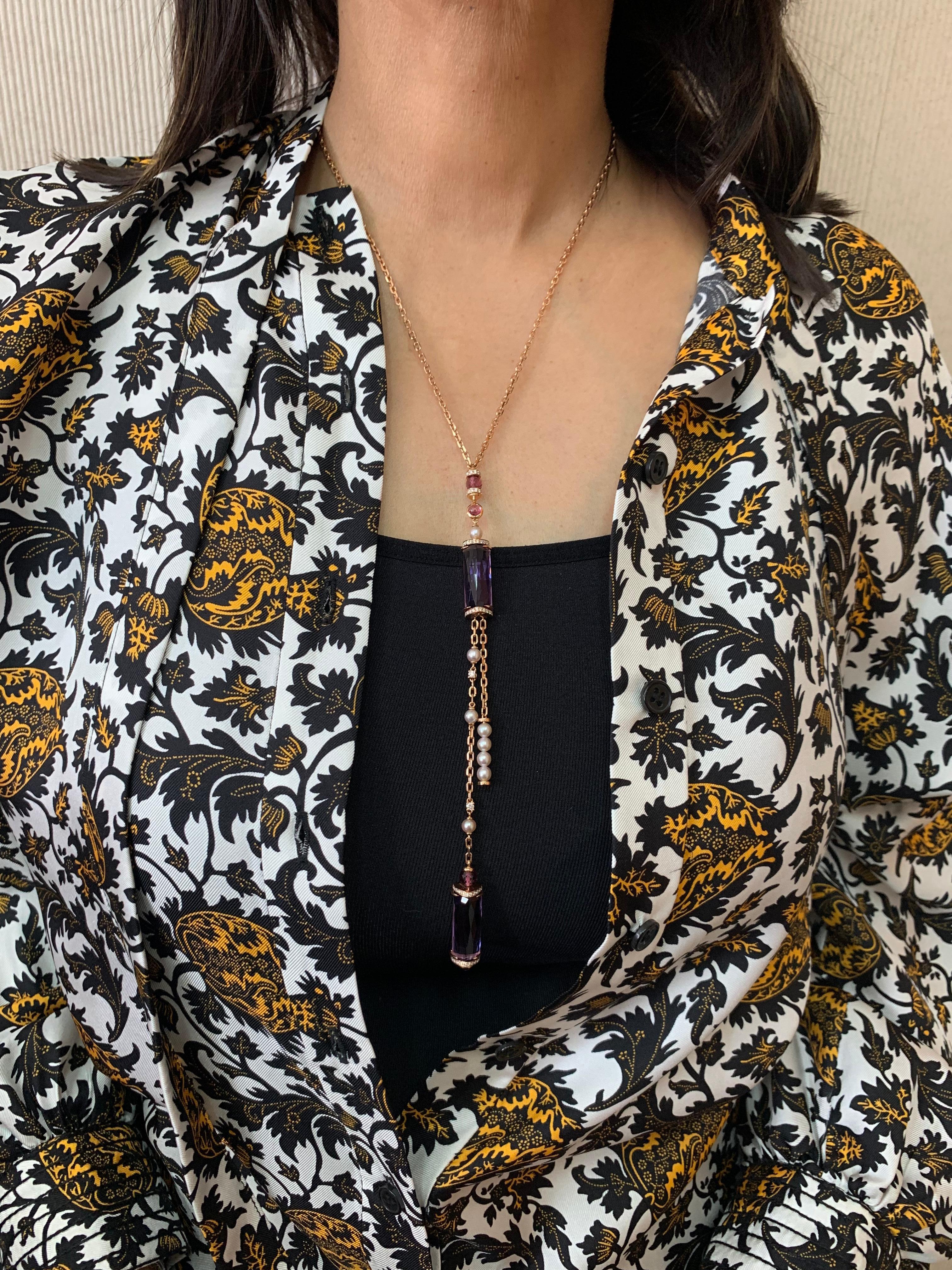 This is a chic amethyst lariat necklace in a unique baguette briolette cut to accentuate the beauty of the gemstone. This is a light and fun lariat necklace with a pop of color with the use of these elongated gems. The necklace is given subtle yet