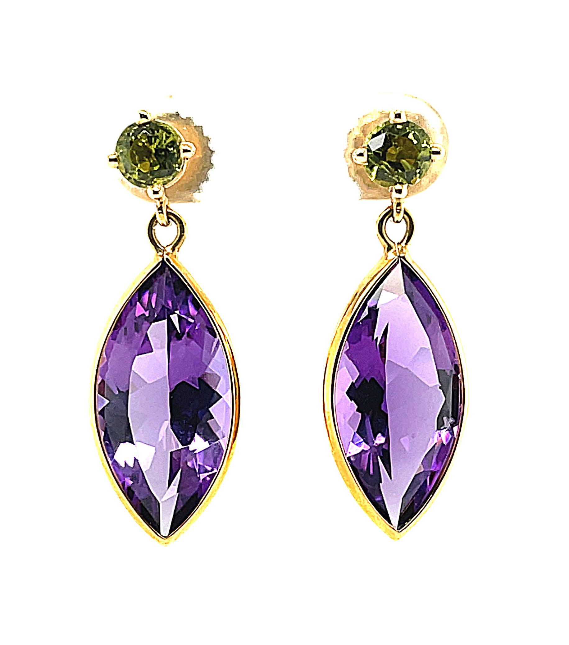 The unique combination of gemstone colors and shapes make these earrings so special. Two round, bright 