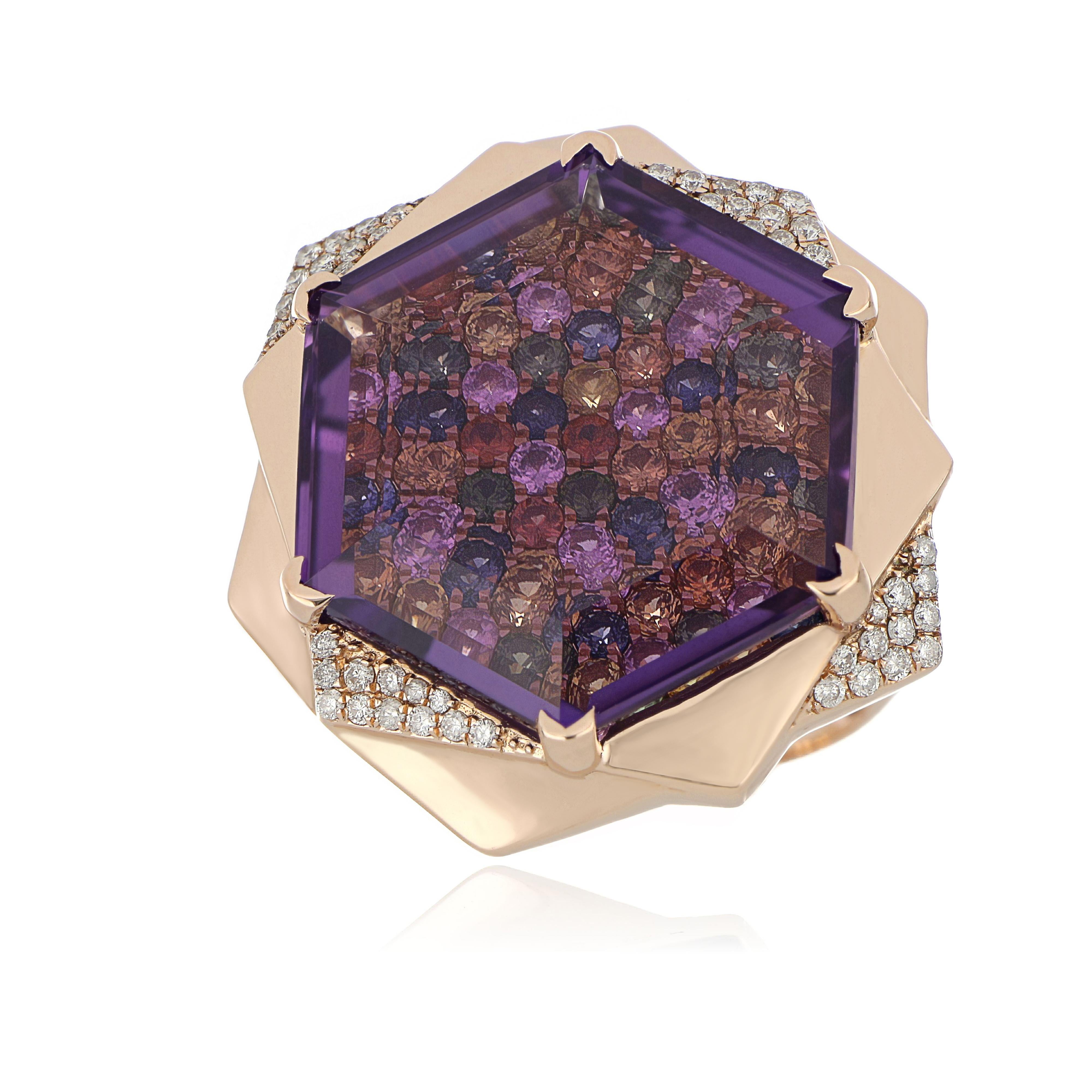 14 Karat Rose Gold ring studded with Hexagon Cut  22.14 Ct  Amethyst,  with unique under stone setting of 3.35 Ct Multi Sapphire accented with 0.27 Cts Diamond Beautifully hand crafted in 14 Karat Rose Gold.

Stone Details:
Amethyst: 22.4 x 19.8