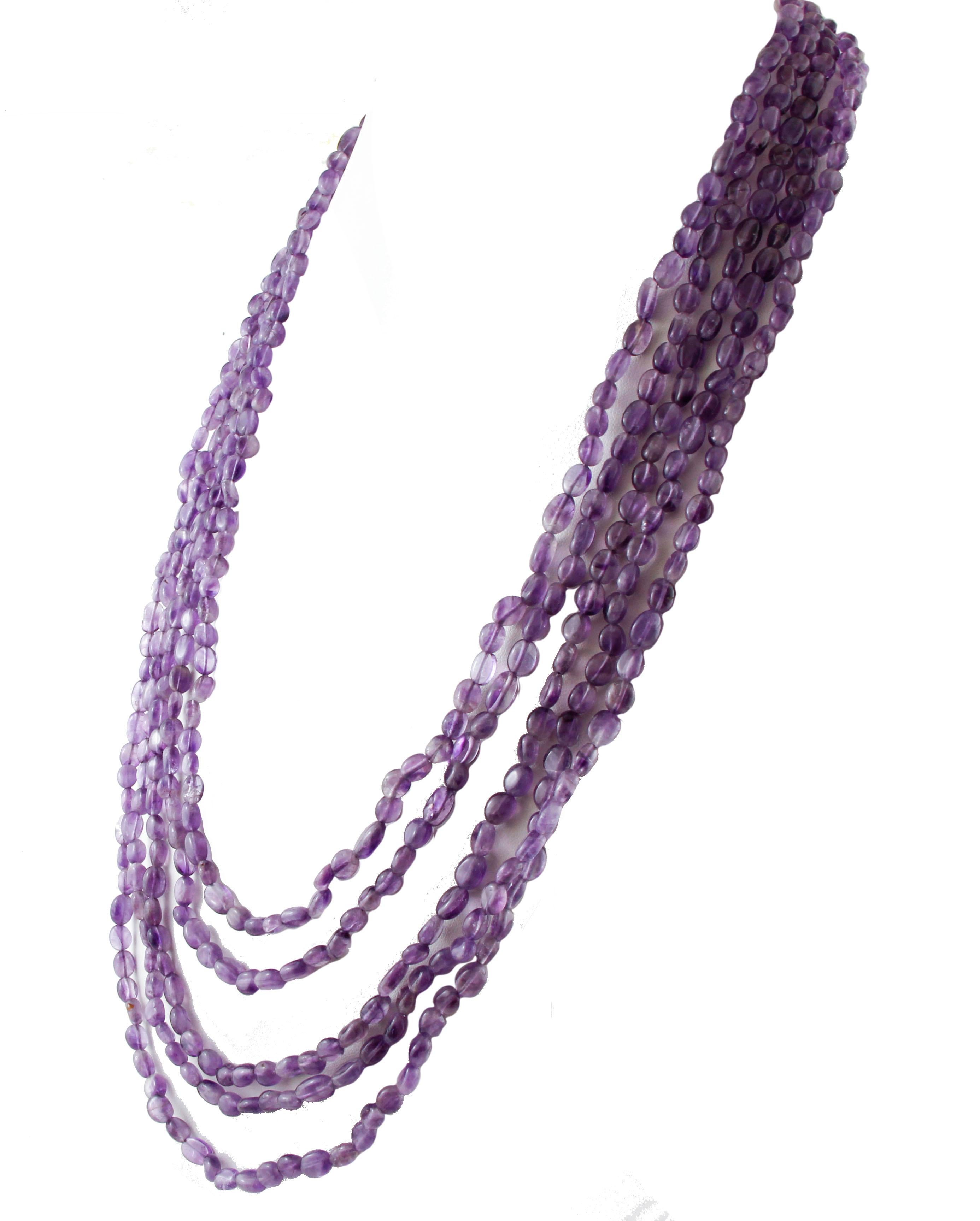 Wonderful multi-strands beaded necklace realized with 5 strands of intense amethysts and a simple closure in 18k yellow gold. 
This unique-of-a-kind necklace is totally handmade by Italian master goldsmiths
Amethyst 571.5 ct
Total weight 118.3