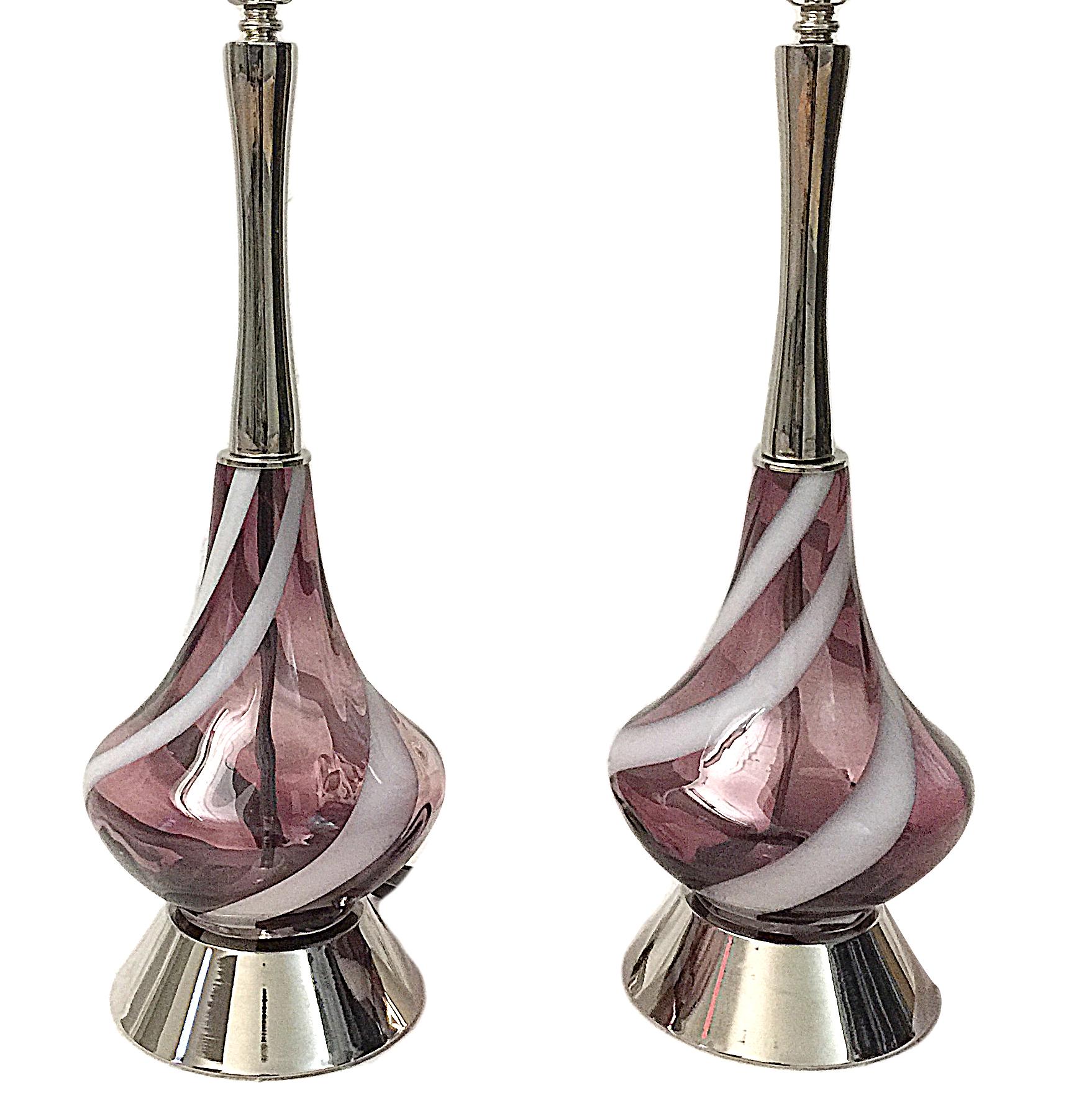 Pair of 1960's ribbon amethyst and white Venetian glass table lamps with brass bases.

Measurements:
Height of body: 23