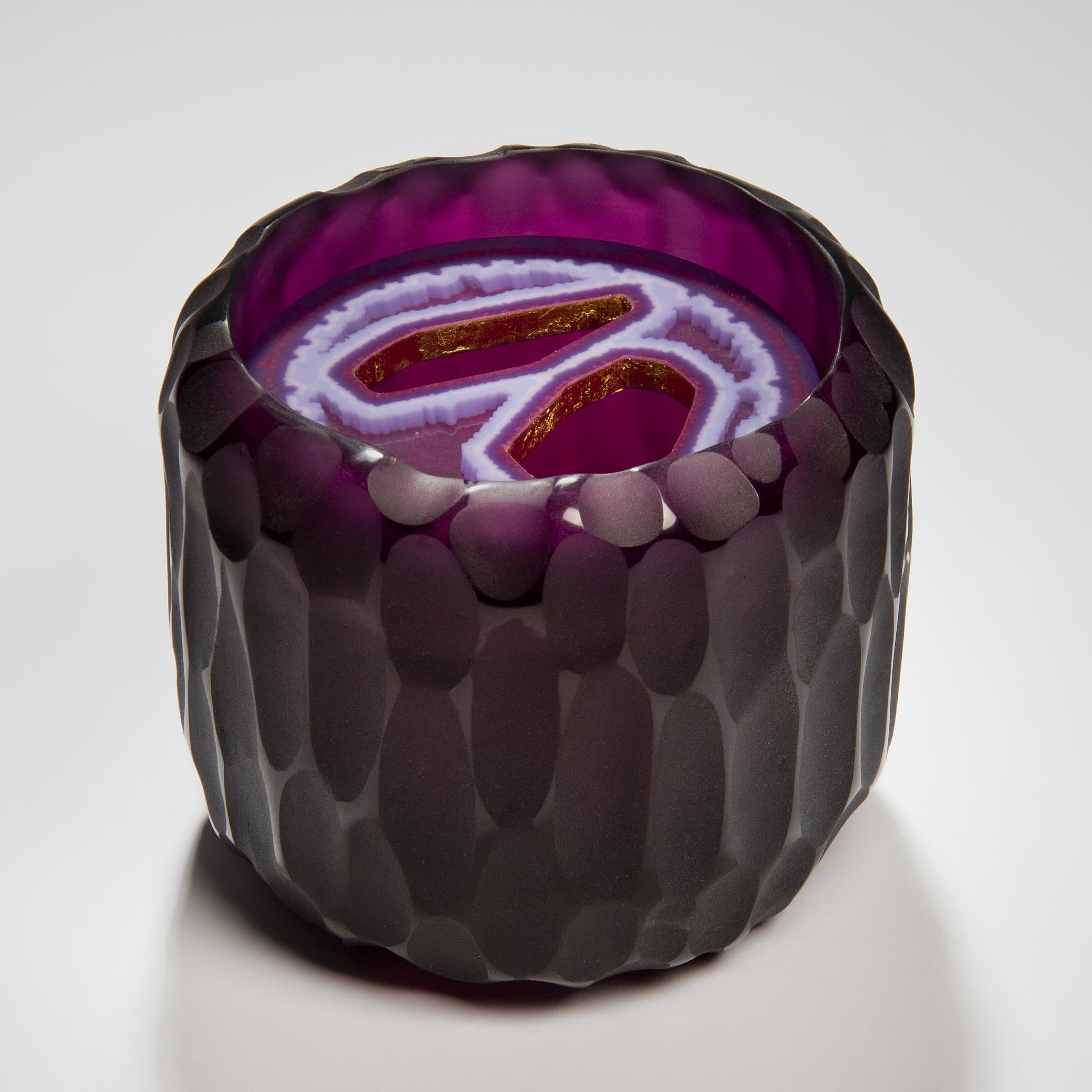 Amethyst Murini Agate Jar is a unique purple and pink sculptural / jar artwork created from cast glass by the British artist Angela Jarman. Using the lost wax technique, the base is purple lead crystal. The top disc insert is created from purple,