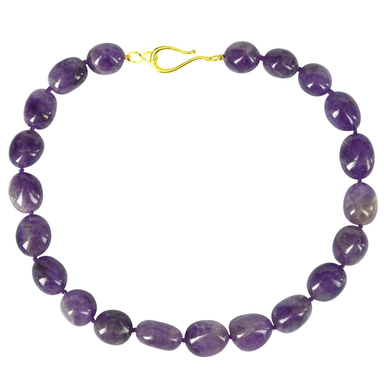 Amethyst Polished Nugget with a 29mm  Gold Plate Sterling Silver hook Clasp, hand knotted for strength and durability.

Finished necklace measures 46.5cm.

Custom modification available on request
Custom modification available on request
Hand