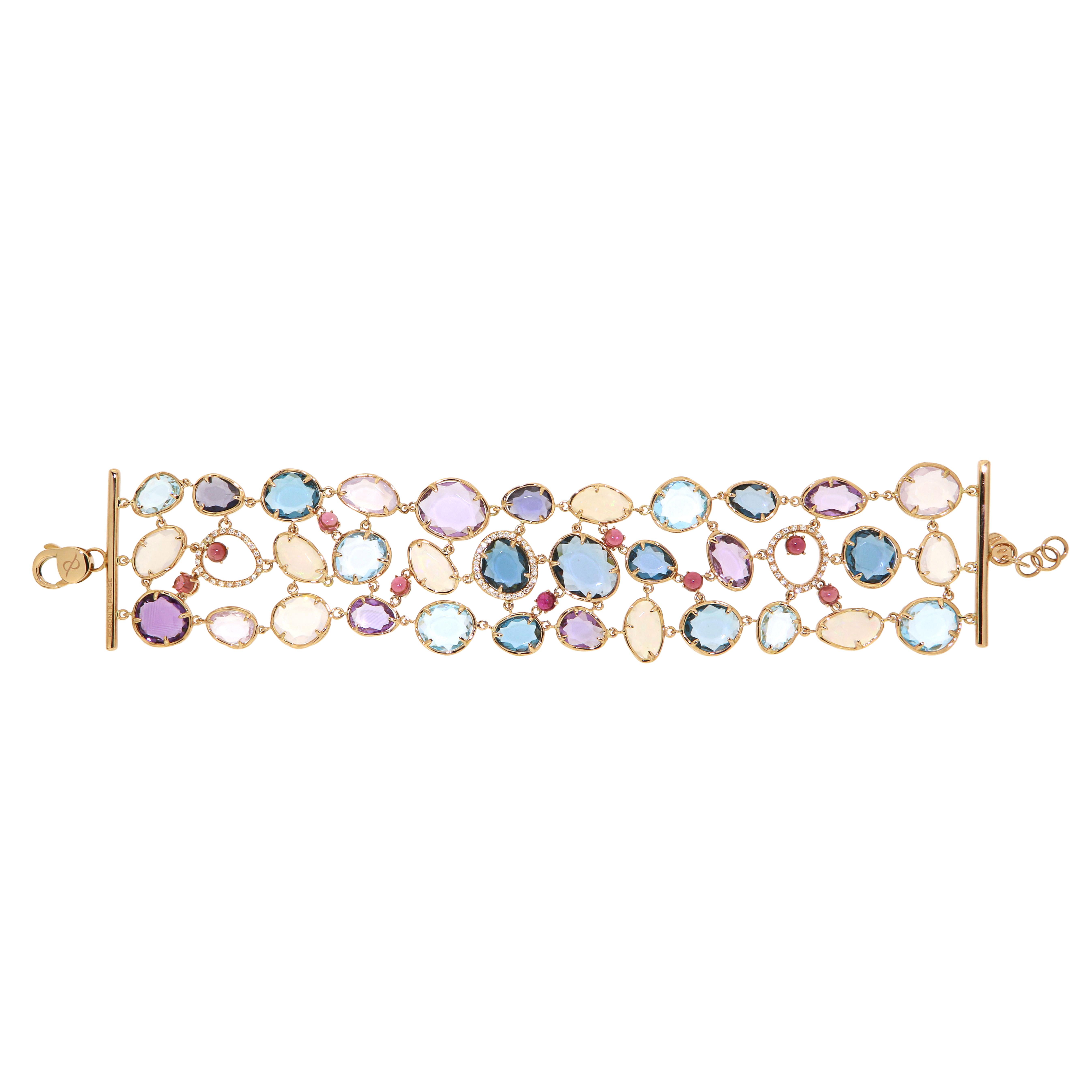 Bracelet Rose 18K Gold 

Diamond 0,99 ct
Pink Tourmaline
Amethyst
London blue topaz
Sky blue topaz 
Opal
Sunflower Quartz, Lilac Quartz 
Pink Tourmaline

Size 21
Weight 47

It is our honour to create fine jewelry, and it’s for that reason that we