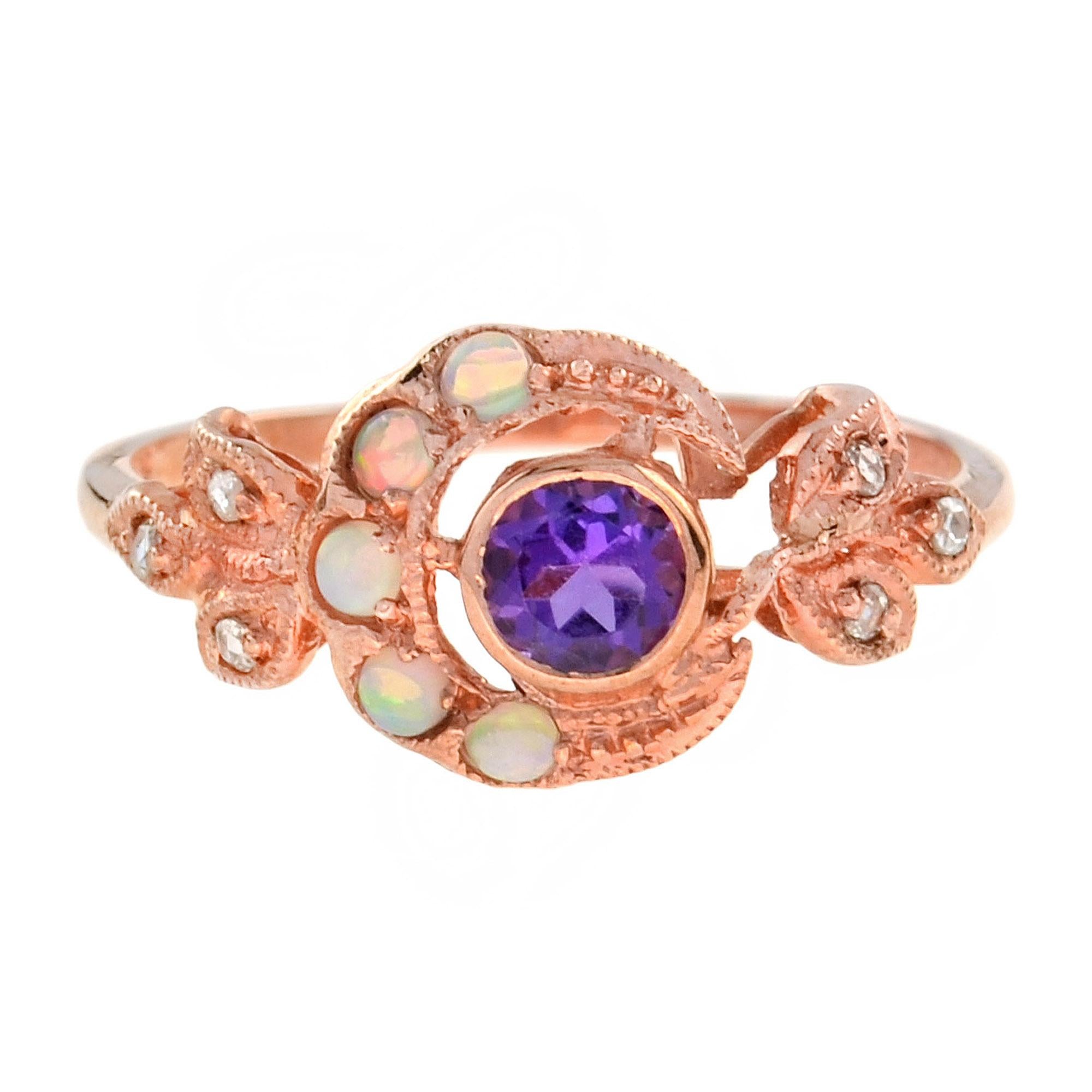 A stunning 9K rose gold Victorian Era ring, featuring an Amethyst adorned with opal and diamonds on shoulders.  

Ring Information
Style: Victorian 
Metal: 9K Rose Gold
Weight: 1.61 g.(approx.)

Center Gemstones
Type: Amethyst
Shape: Round
Size: 4