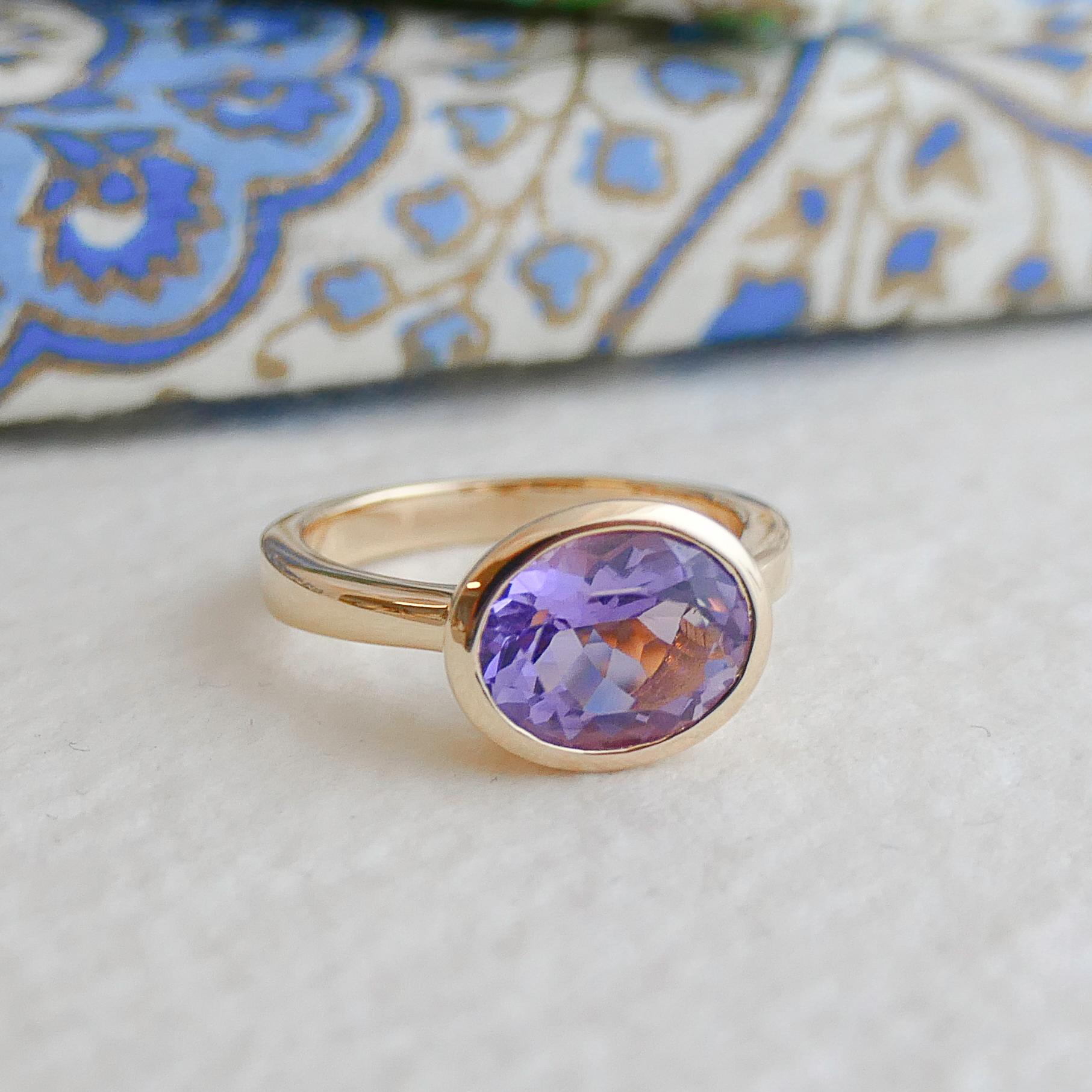 8x10mm Oval Faceted Amethyst is set in gold-plated 925 sterling silver.
Available in sizes 6, 7, 8 and 9.  Please let me know what size you want when you order.