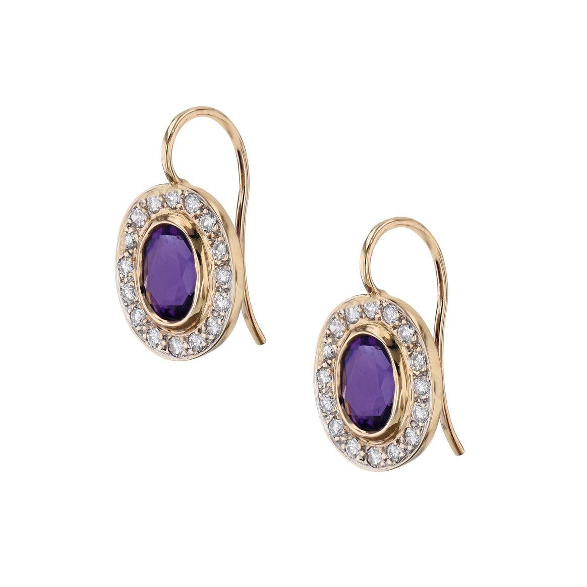 Glimmering with character, these dazzling Amethyst Pave Diamond Estate Earrings will turn heads! Set in 14kt yellow gold, the pave diamonds elegantly accentuate the amethyst stones. A gorgeous earring set from the H&H Estate & Vintage Collection,