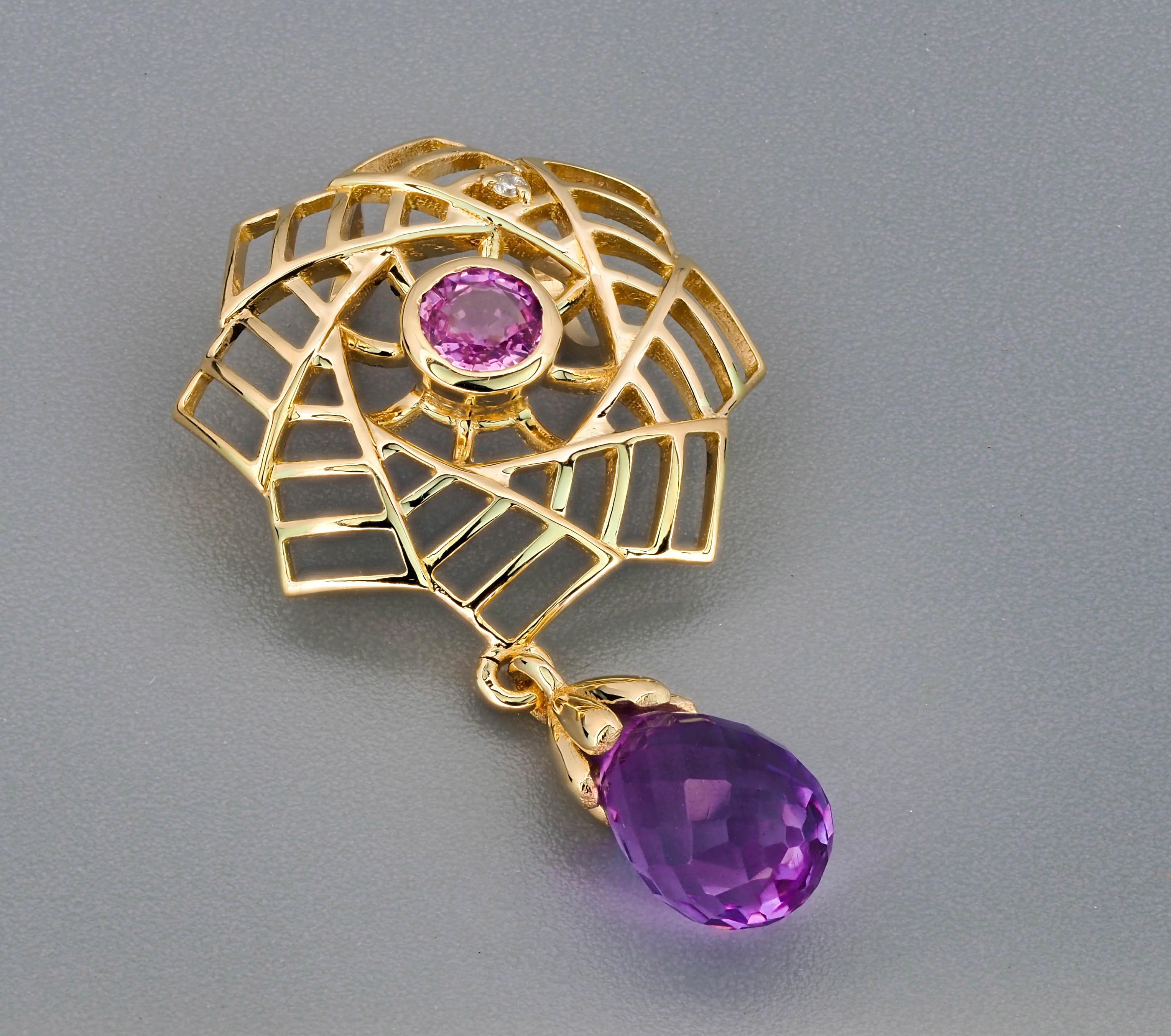 14k gold pendant with amethyst, sapphires and diamonds. Amethyst pendant in 14k gold. Pink sapphire pendant in 14k gold. 

Material: 14k gold
Weight: 1.53 g.
Pendant size: 25x13.46 mm
Amethyst:
1 piece, lavender - violet - color, briolette cut,