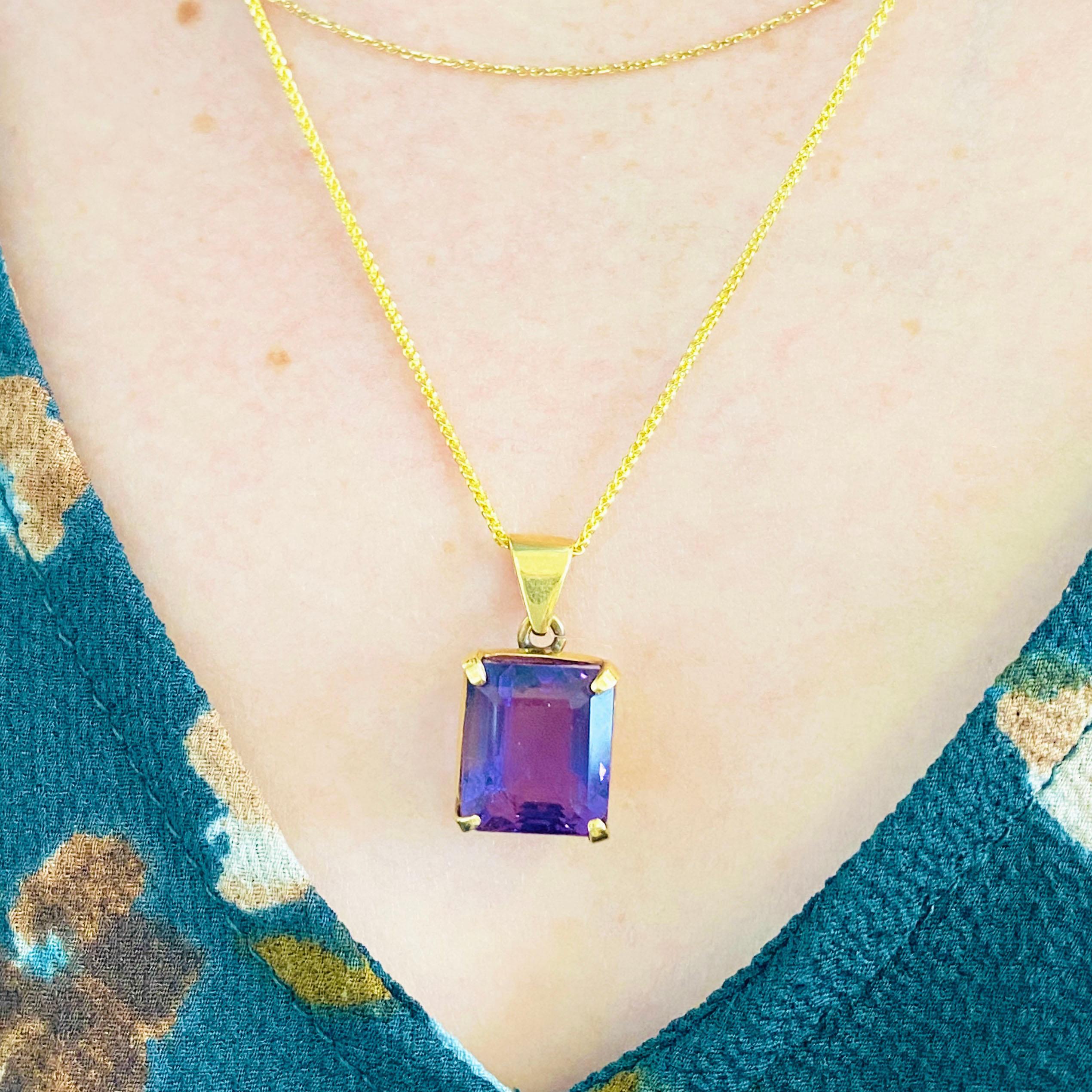 This beautiful vibrant emerald cut amethyst set in polished 18k yellow gold provides a look that is very modern yet classic! You won't believe how stunning this stone is. This necklace is very fashionable and can add a touch of style to any outfit,