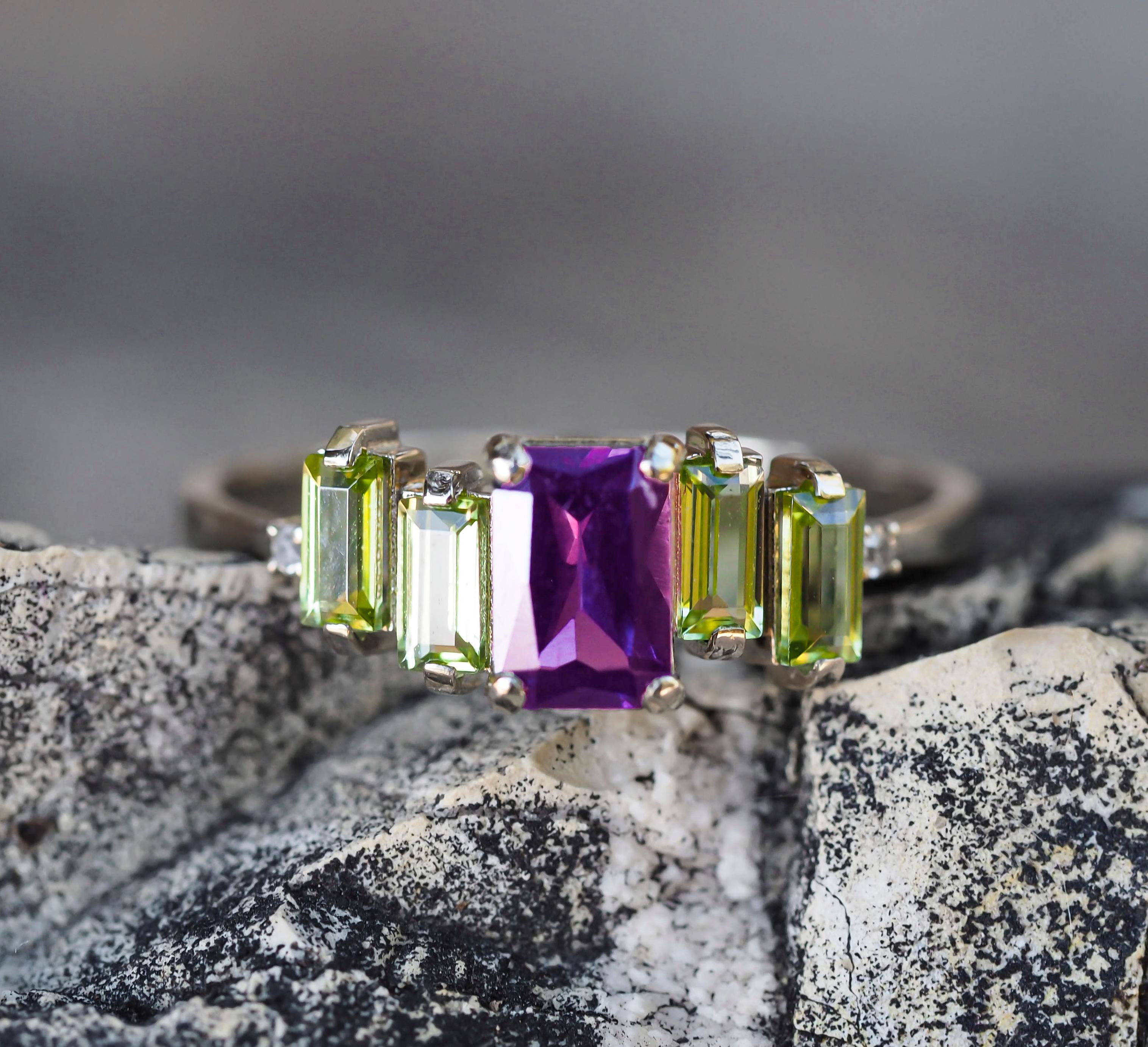 Amethyst, peridot 14k gold ring. 
Purple, apple green gemstone ring. Baguette gems ring. Colorful ring with amethyst, peridot.

Weight: 2.2 g depends from size.
Metal type: 14k solid gold.

Central stone:
Amethyst: octagon shape, purple color,