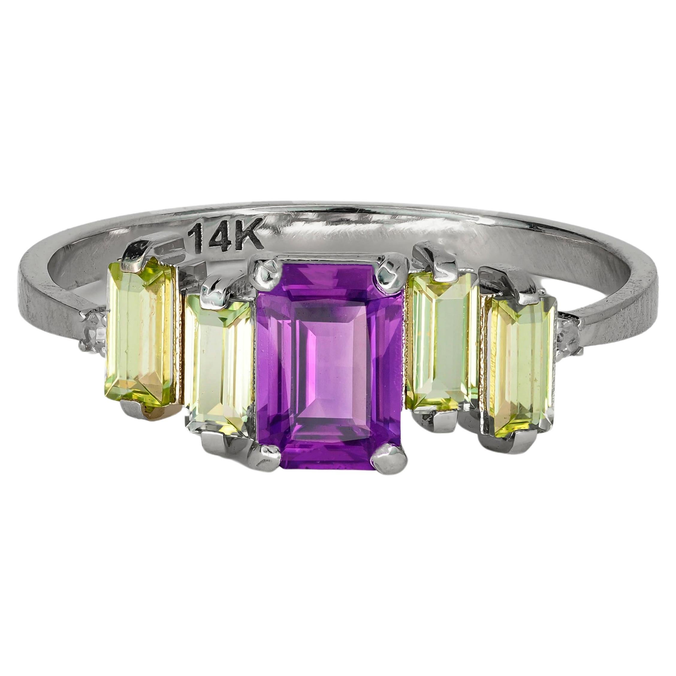 Ring mit Amethyst und Peridot aus 14k Gold. 