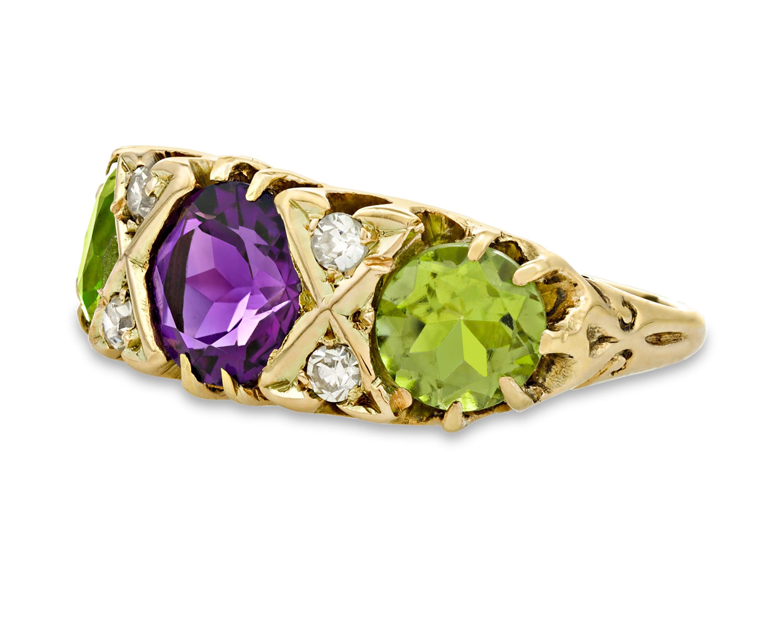 Remarkable historical significance distinguishes this Victorian Suffragette ring. This exquisite work of jeweled art was worn by a British Suffragette to show her support for the movement. The official colors of the women's suffrage movement were