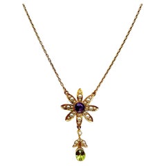 Amethyst, peridot and Pearl  15 Karat Gold Flower Pendant Necklace Circa 1900