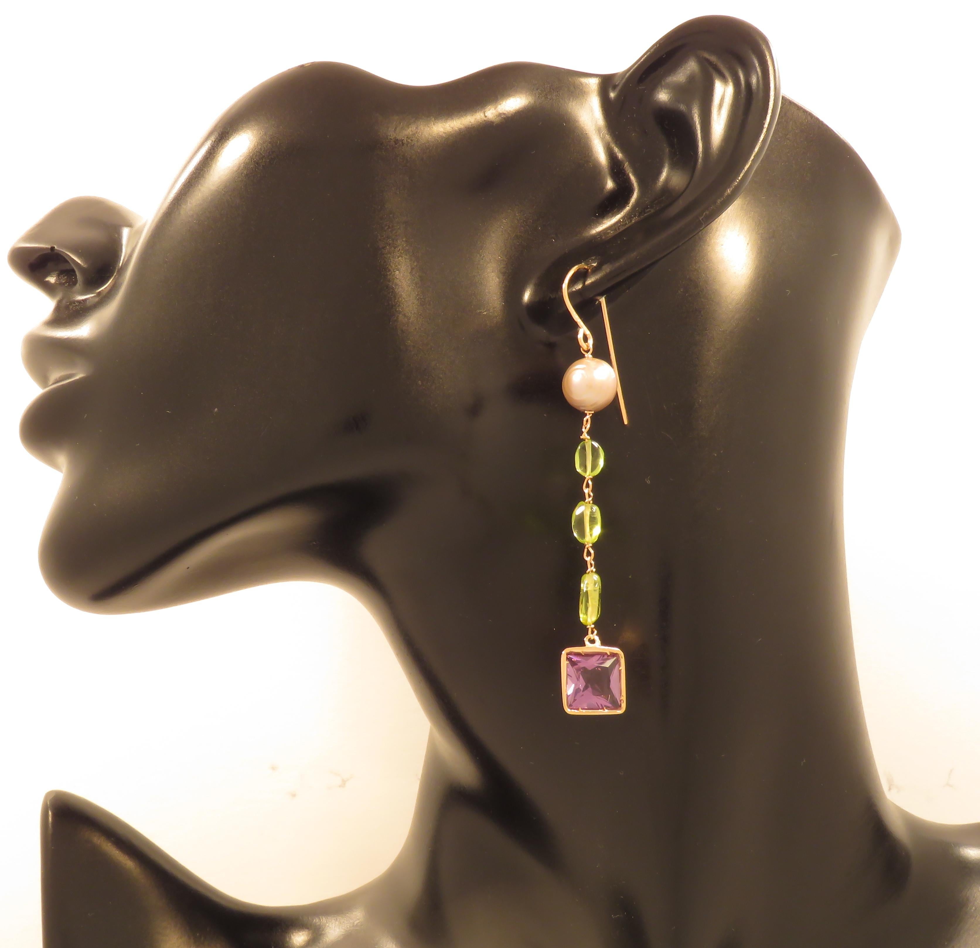 Lovely dangle earrings with square cut amethyst, 6 nugget cut peridot and 2 freshwater pearls. Crafted in 9 karat rose gold. The length of each earring is 65 mm / 2.559 inches. Marked with the Italian gold mark 375 and Botta Gioielli brandmark