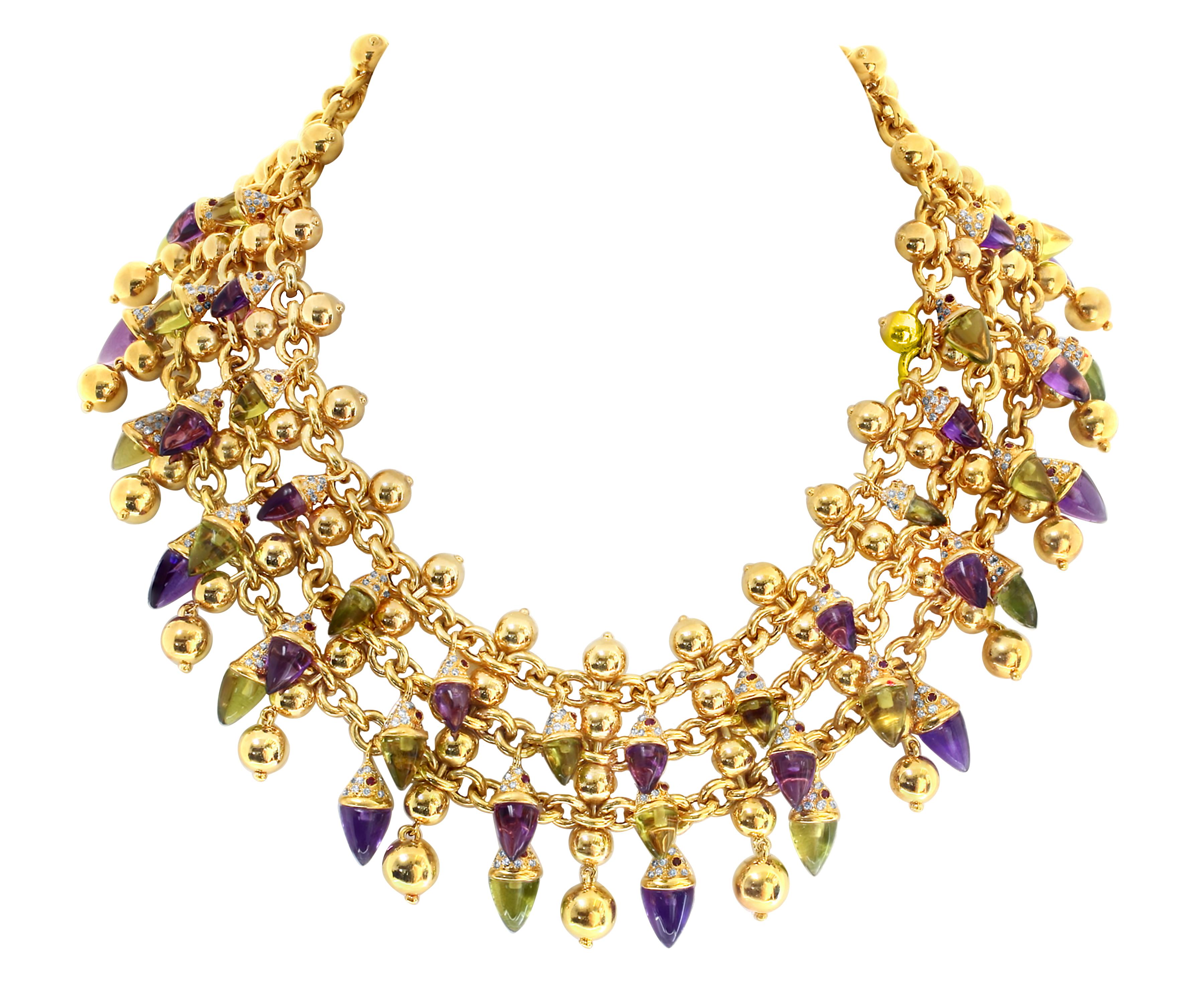 
Designed as a bib set with Amethyst and peridot in  Trilliion  cut Cabochon with  Ruby  and diamonds, mounted in 18 Karat  yellow gold  
Each Trillion has 1 ruby and 10 diamonds 
There are 42 trillions, 21  of Amethyst and 21 of the peridot
Solid