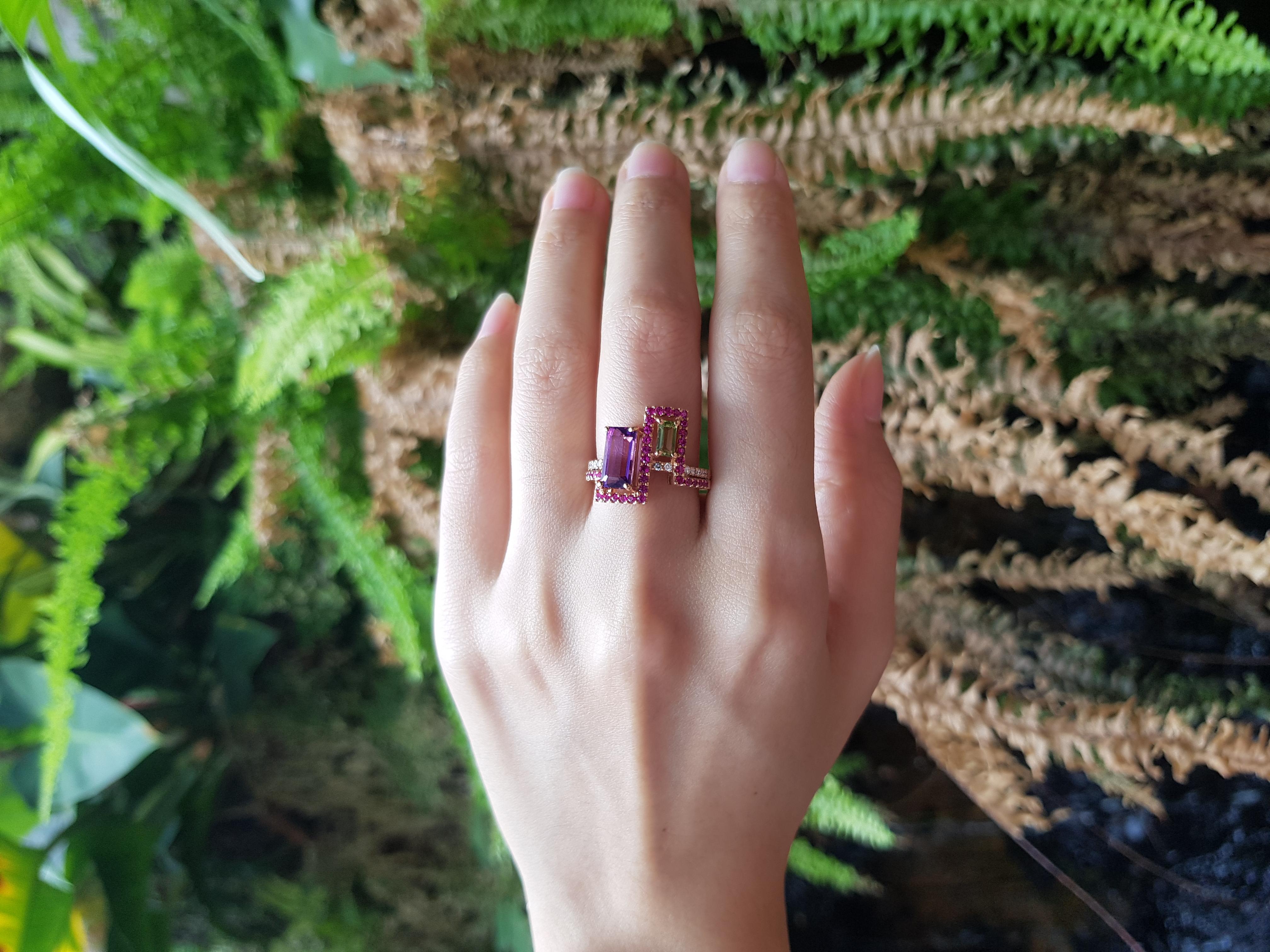 Amethyst 1.58 carats, Peridot 1.12 carats, Pink Sapphire 0.46 carat and Diamond 0.11 carat Ring set in 18 Karat Rose Gold Settings

Width:  1.5 cm 
Length:  1.6 cm
Ring Size: 54
Total Weight: 6.42 grams

Uncompromisingly modern and exuding, the