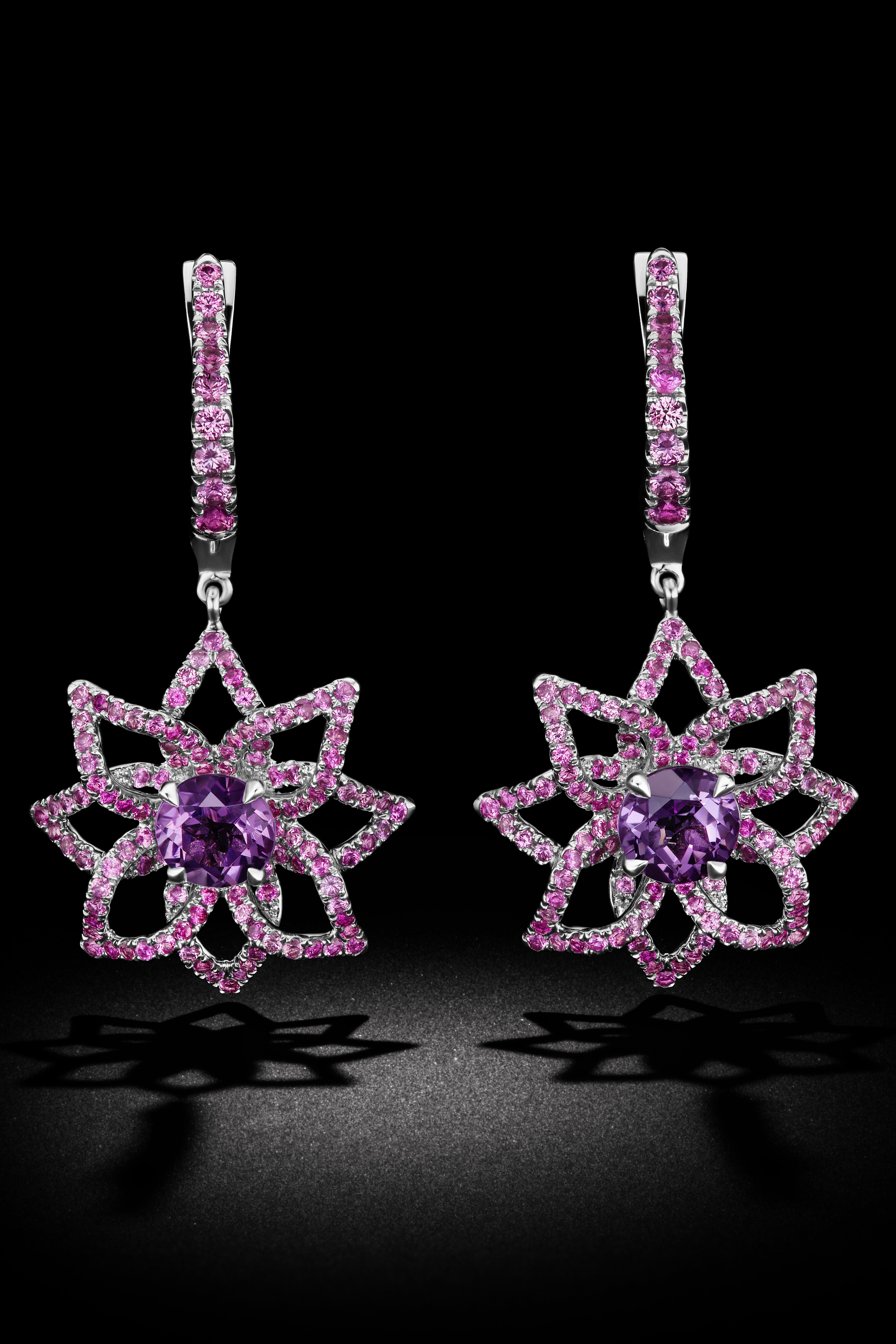 Amethyst Earrings with Pink Sapphire on Clip Earrings with over 3.50 carats of gemstones all set in 13.4 grams of Platinum. 

