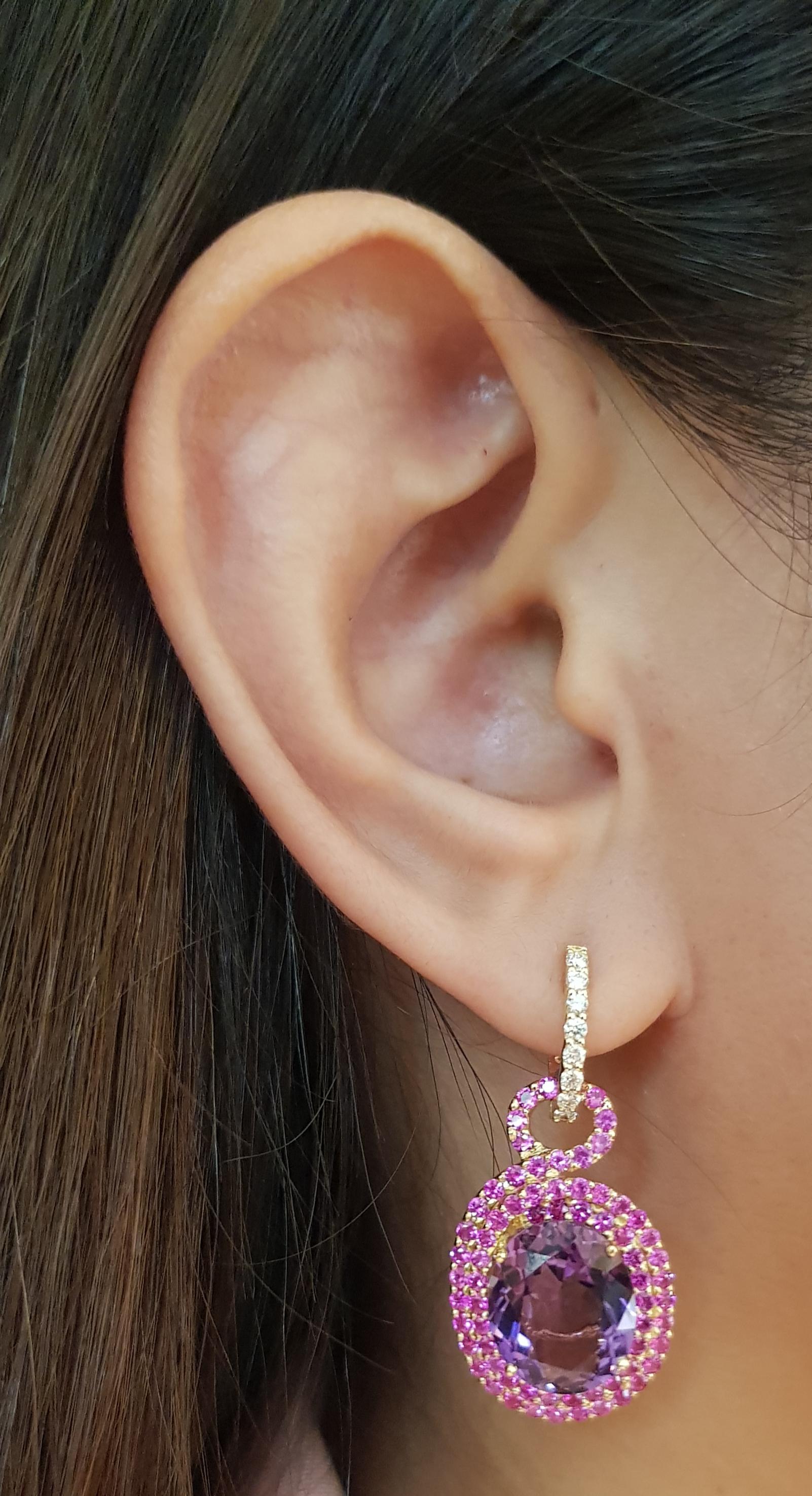 Amethyst 10.39 carats, Pink Sapphire 2.52 carats and Diamond 0.28 carat Earrings set In 18 Karat Gold Settings

Width:   1.7 cm 
Length:  3.8 cm
Total Weight: 11.56 grams


