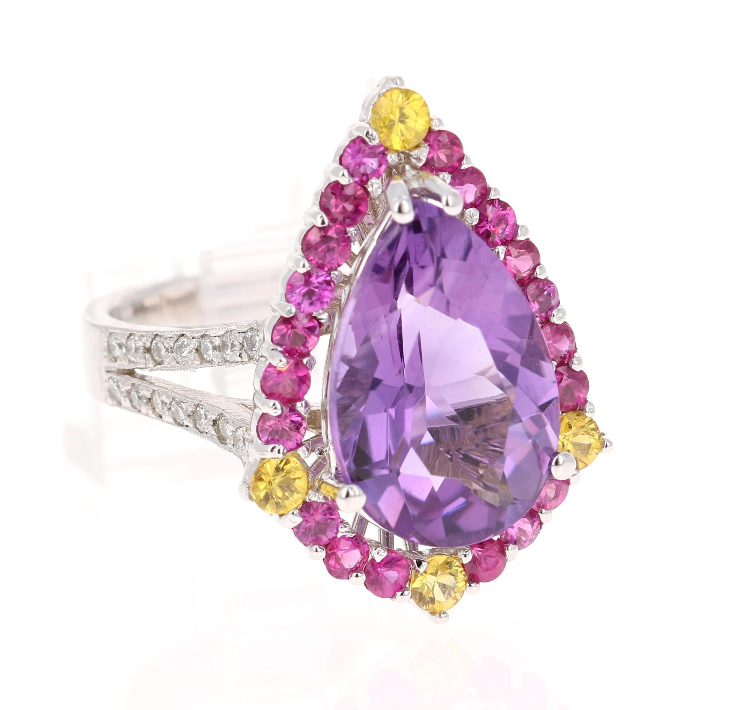 Amethyst Pink Sapphire Diamond White Gold Cocktail Ring

This unique beauty has a Pear Cut Amethyst weighing 5.08 carats and has a halo of Round Cut Pink Sapphires that weigh 0.86 carats along with a sprinkle of Yellow Sapphires that weigh 0.33