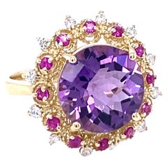 Anello Cocktail in oro giallo con diamante e zaffiro rosa ametista