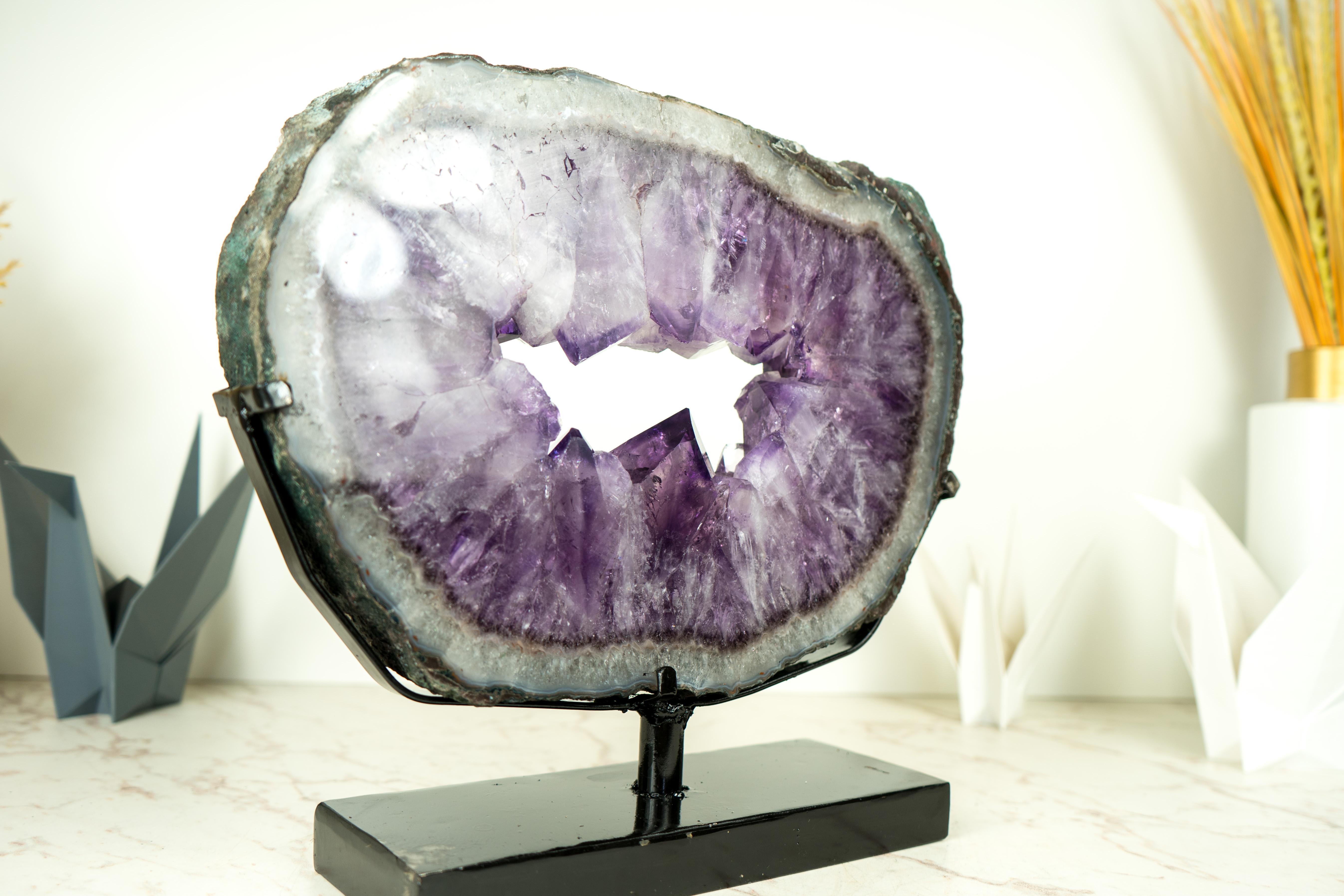 Gorgeous Amethyst Portal with Large Saturated Purple Amethyst Druzy and Blue Lace Agate

▫️ Description

An Amethyst Geode portal with many special qualities, this Amethyst brings large, perfect Amethyst points surrounded by a layer of blue lace