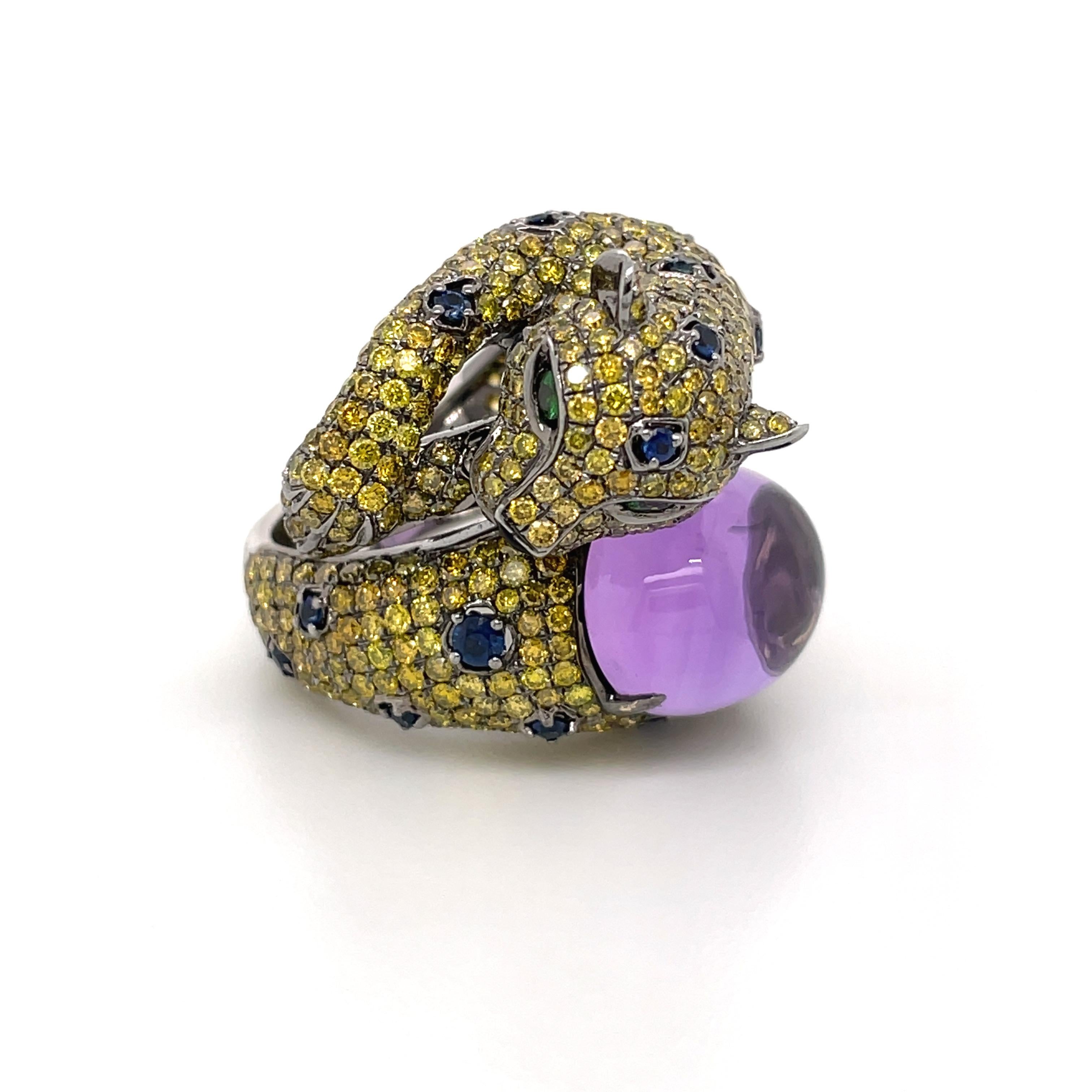 Adorning this magnificent cheetah ring is a regal fusion of elegance and strength. At its heart, a mesmerizing amethyst stone gleams with a deep, enchanting hue that exudes calm and spiritual energy. Surrounding this gem, a fierce cheetah crafted