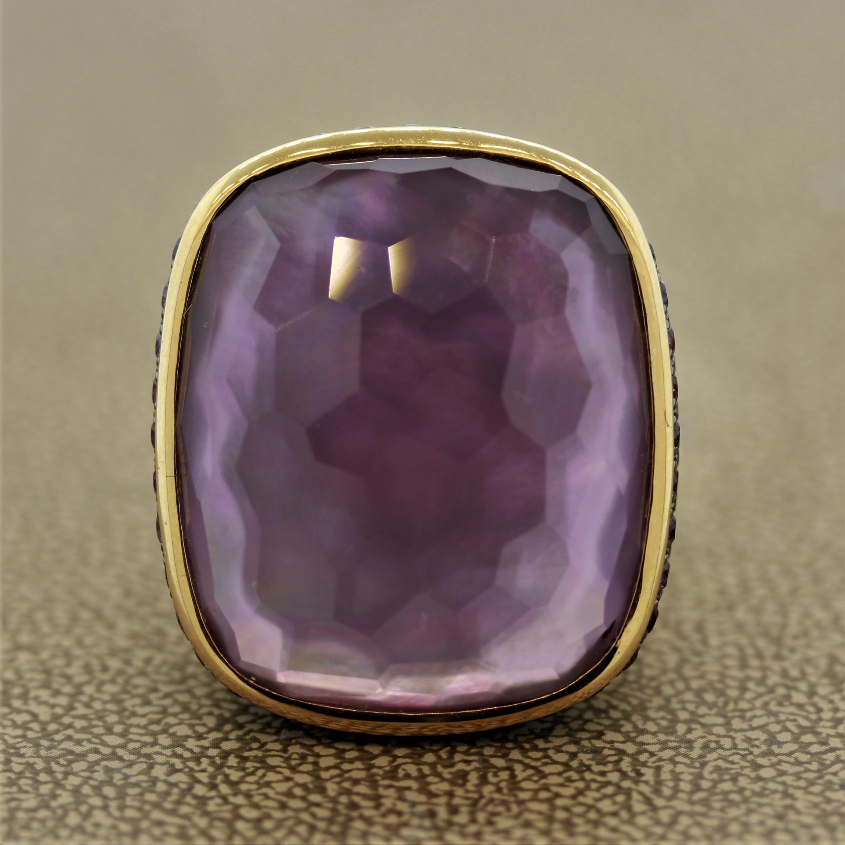 A unique ring featuring a 22.04 carat amethyst set directly over a flat piece of mother of pearl. The bright natural flashes of color from the mother of pearl can be seen from the amethyst giving it a unique look. The sides of the ring are set with