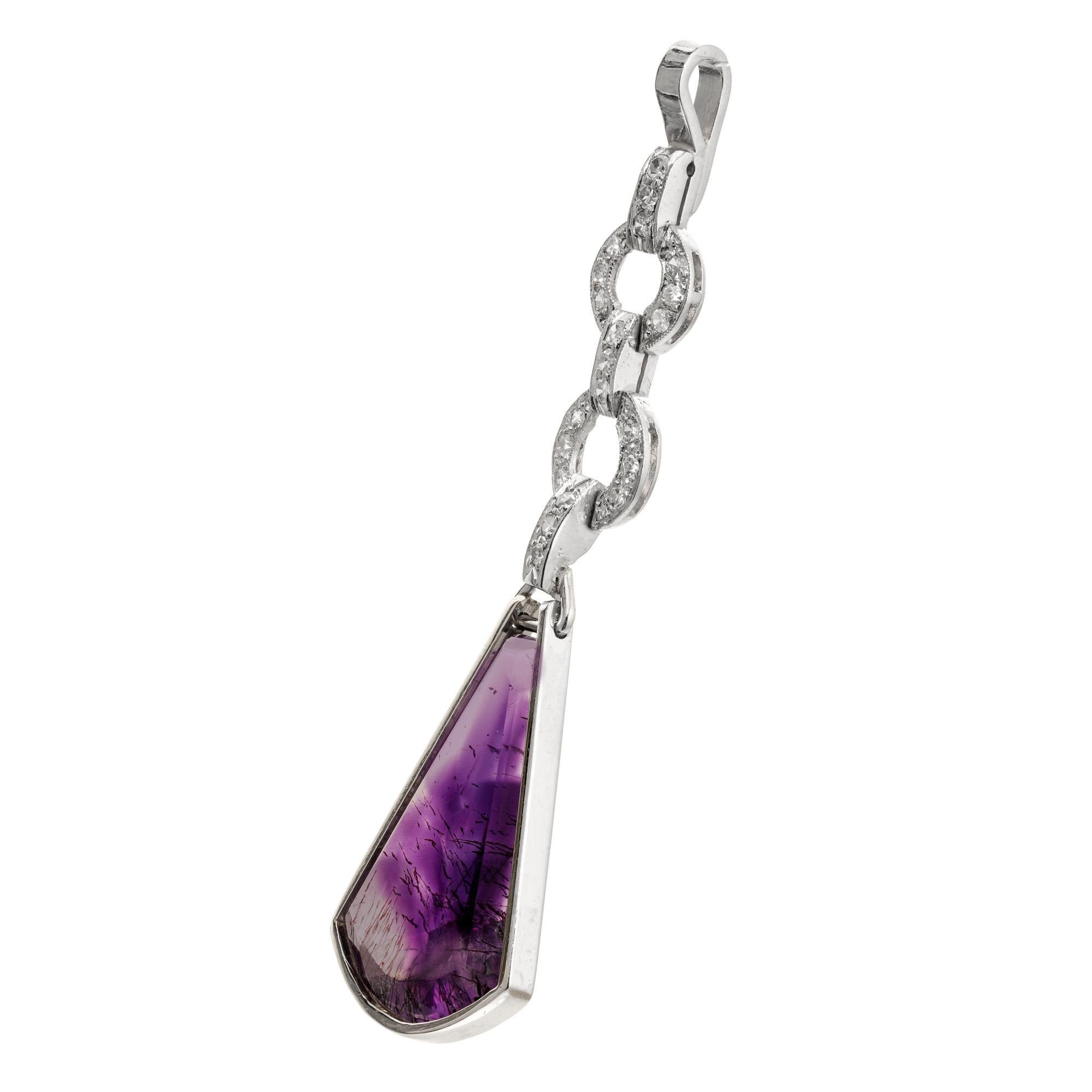 1920's Art Deco Handmade 5 section hinged amethyst and diamond pendant. Triangular 3.25 amethyst set in platinum with a 4 section diamond bail. The cut quartz amethyst has color zoning from clear quartz to deep purple. Rutile needles are in the