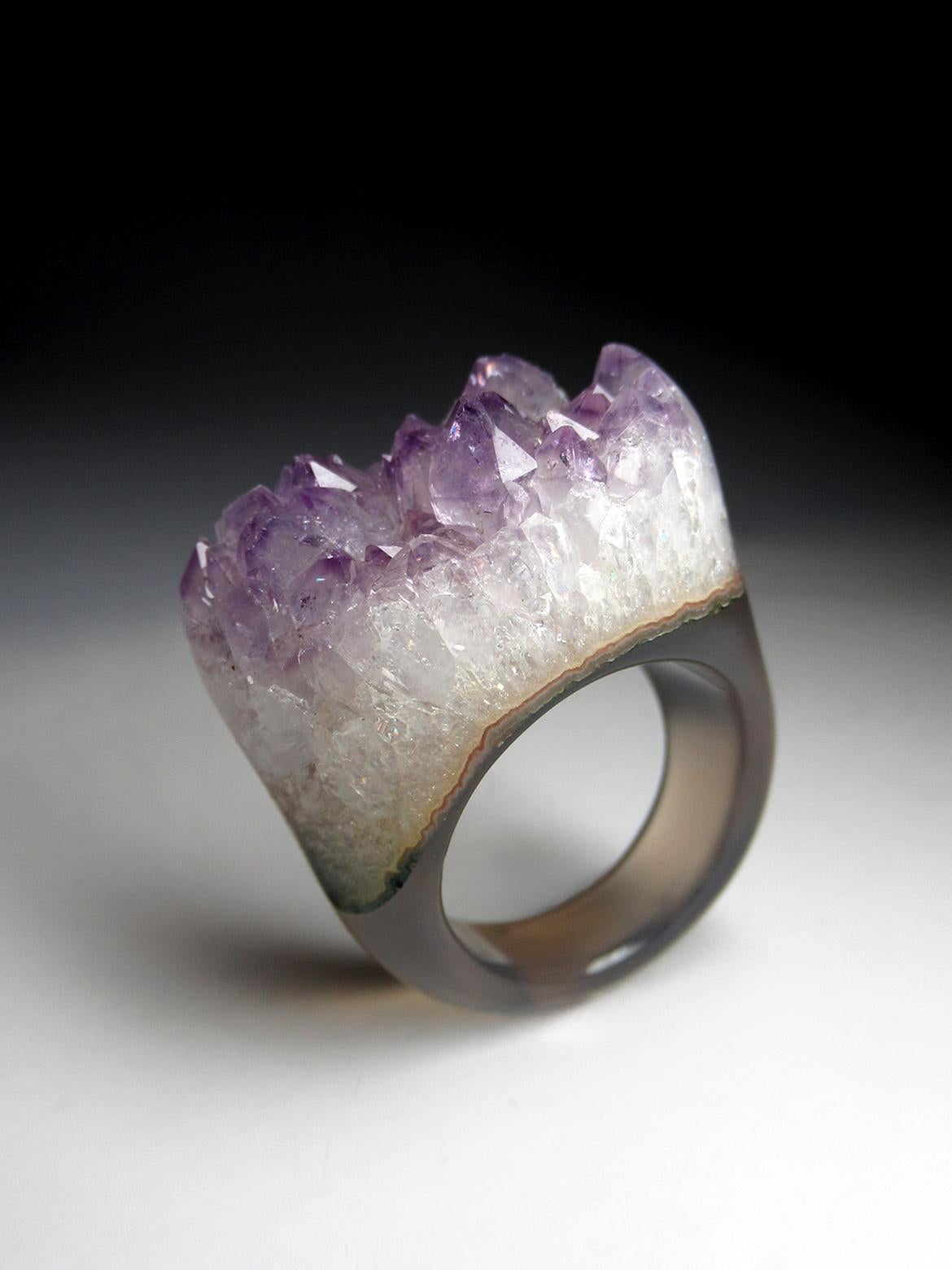 Ring made of natural Solid Quartz Stone with Amethyst Crystals
gemstone origin - Brazil
ring weight - 15.7 grams
ring size - 9 US / diameter 19 / N 20 / circumference 60
stone measurements - 0.59 x 1.06 in / 15 x 27 mm
ref No 6456

Worldwide