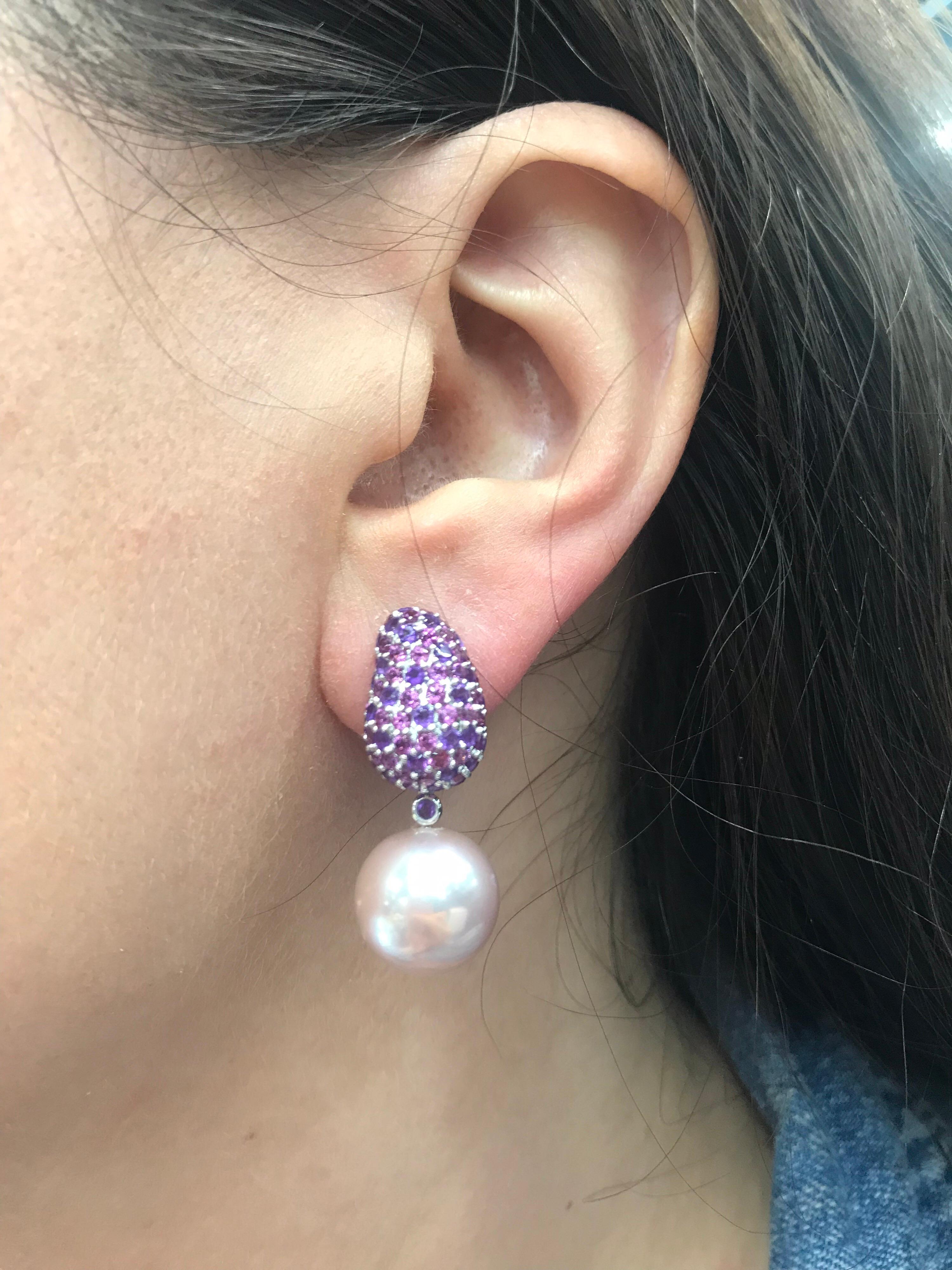 18K White gold drop earrings featuring rhodolite & amethyst weighing 4 carats with two Pink Freshwater pearls measuring 12-13 mm. 