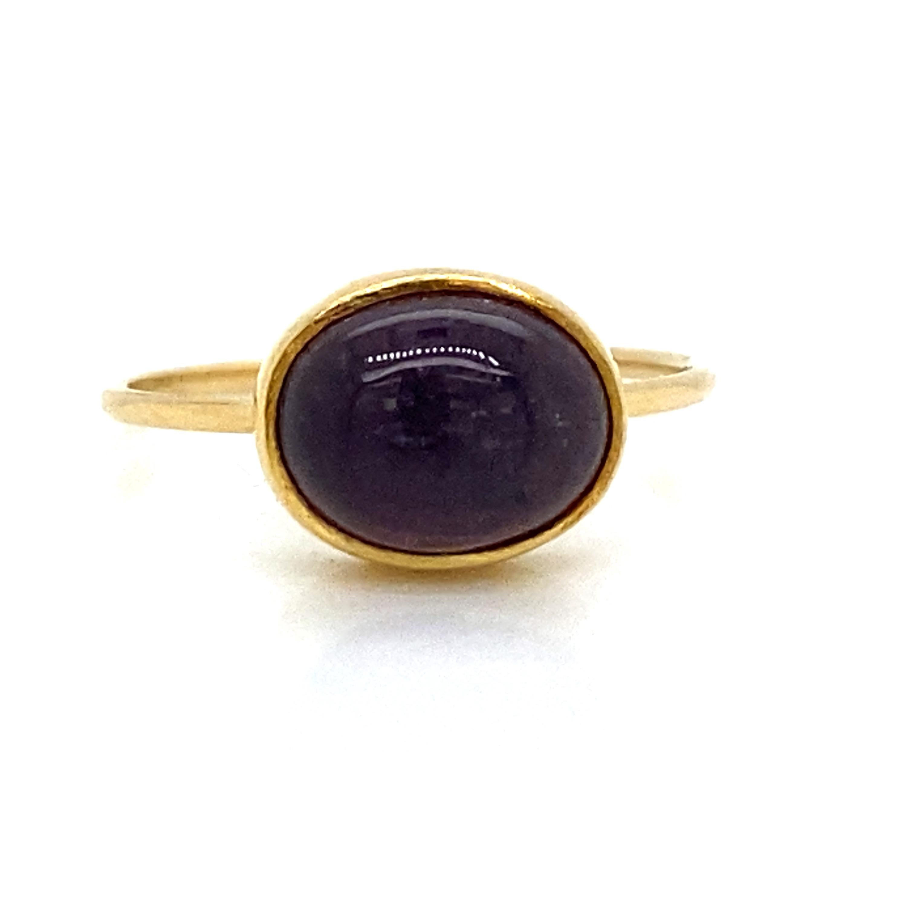 Amethyst Ring in 21K and 18K Yellow Gold. The Ring measures 3/8 inch in width at the widest point.  Ring size 5 1/2.   0.47 grams.