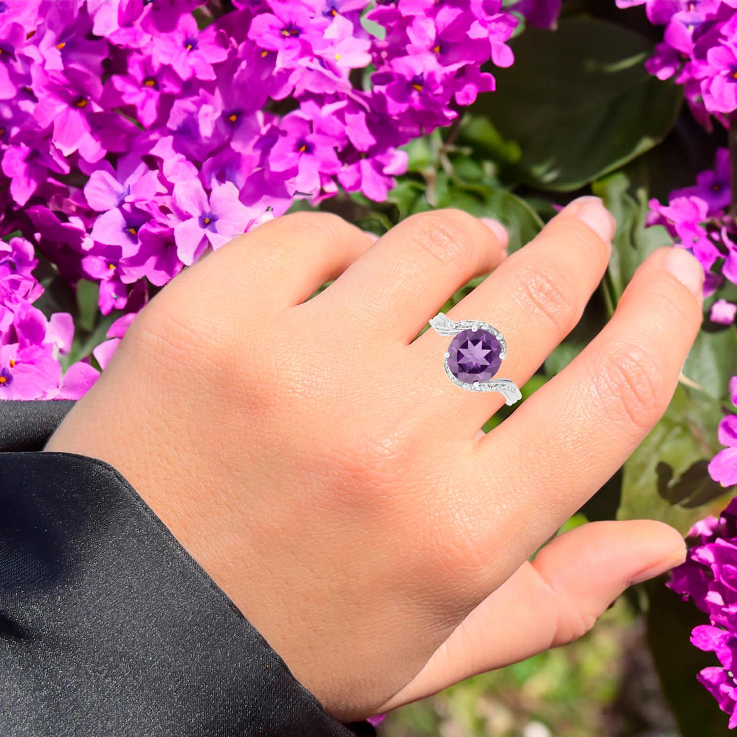 It comes with the Gemological Appraisal by GIA GG/AJP
All gemstones are natural
Amethyst = 2.40 Carats
8 White Topazes = 0.10 Carats
Metal: Rhodium Plated Sterling Silver
Ring Size: 5.5* US
*It can be resized complimentary
