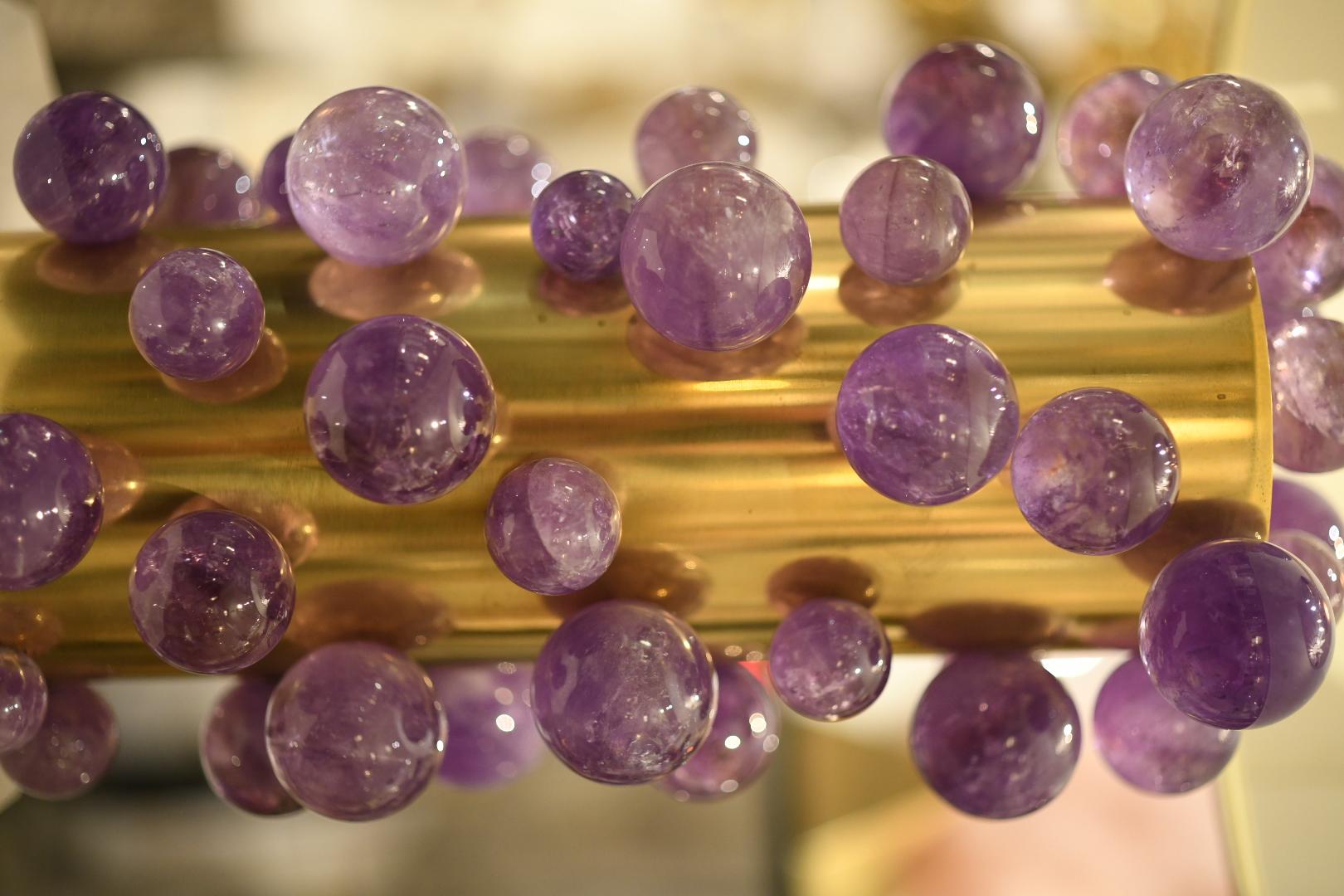 Pair of natural Amethyst rock crystal lamps with polish brass mount. Created by Phoenix gallery NYC.
To the top of the rock crystal bubble: 13.5