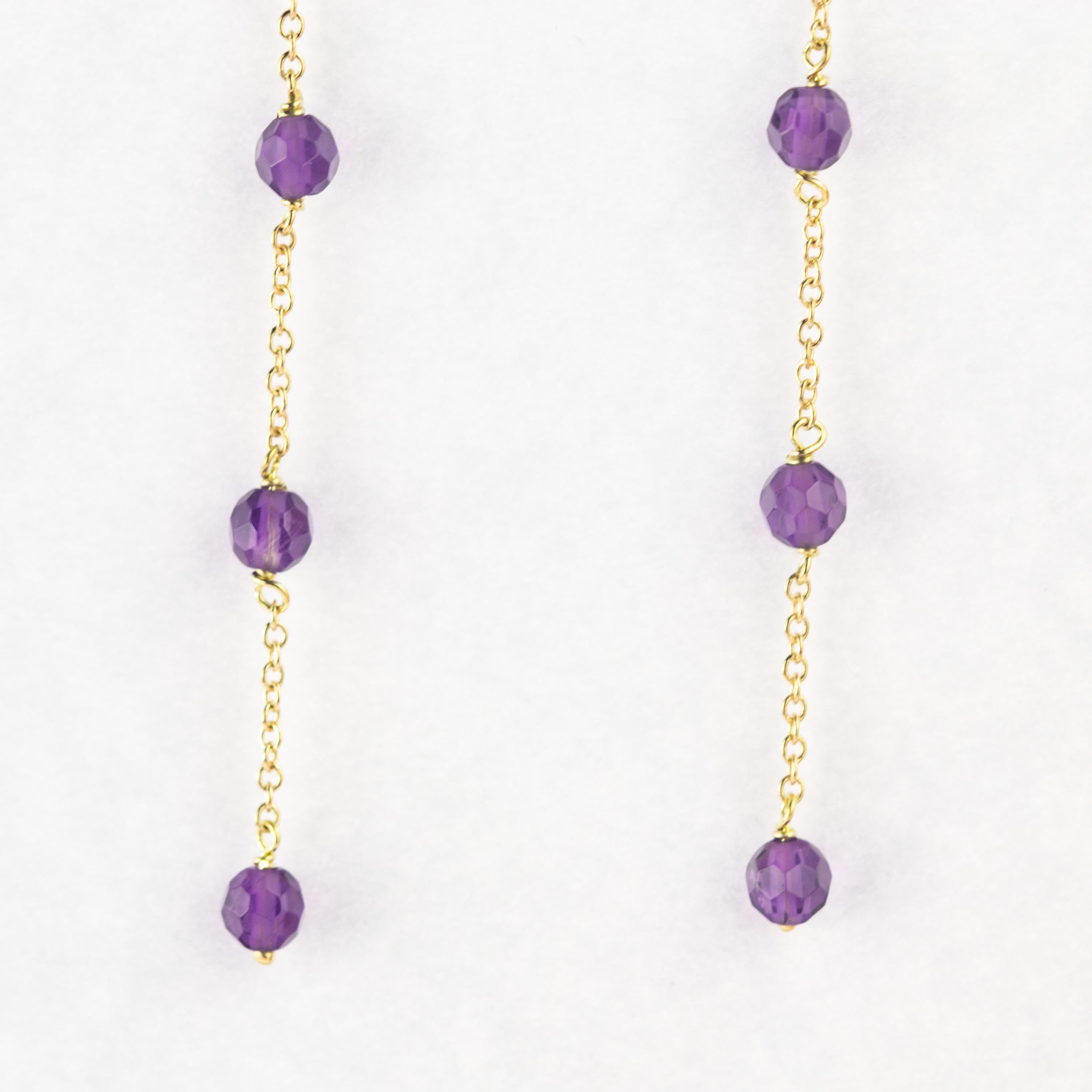 Intini Jewels signature quality on a modern and contemporary design jewel. Stunning long and dangle earrings with three amethyst beads. Embellished with a 18 karat yellow gold chain will make you look beautiful and full of charm

Amethyst is marked
