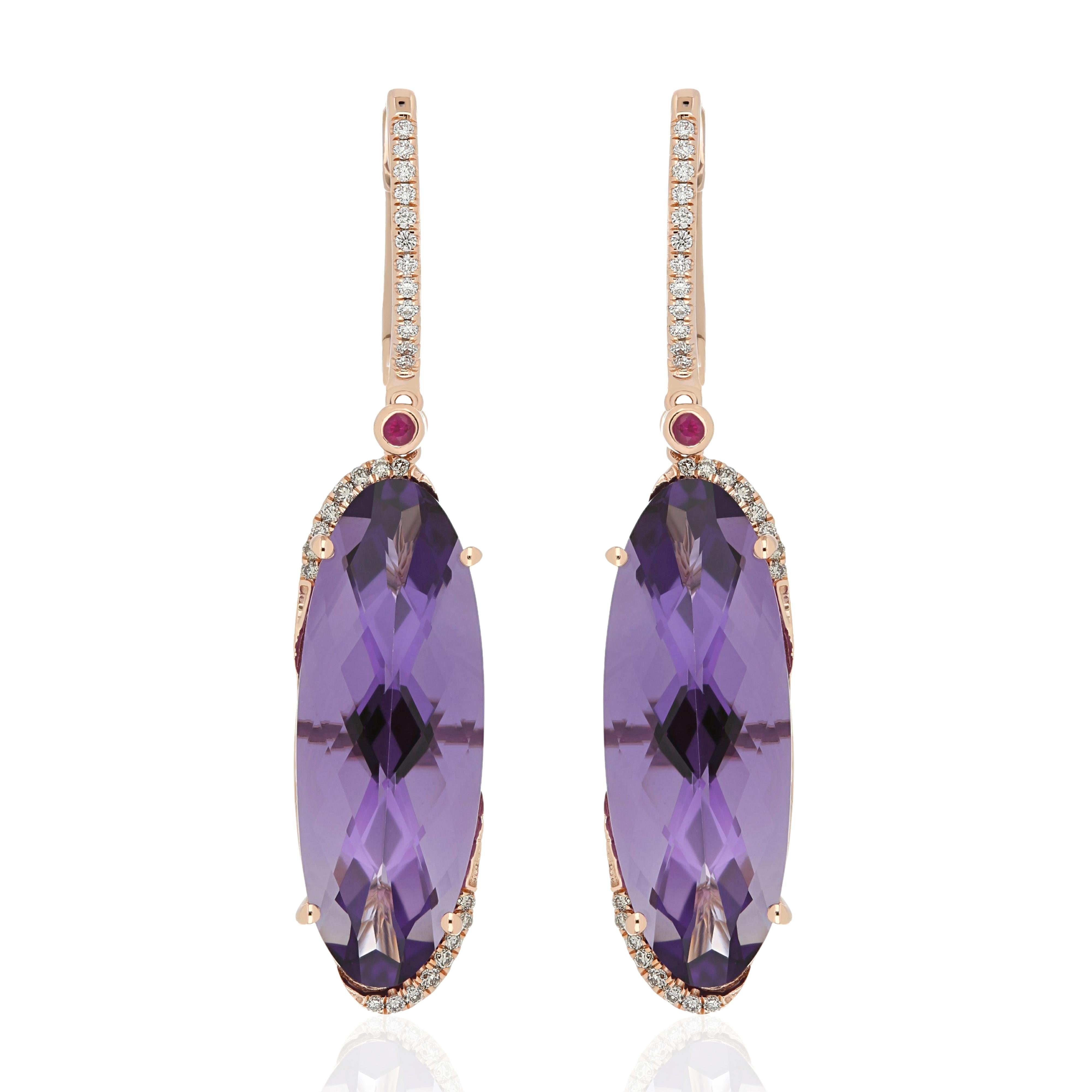Elegant and exquisitely detailed 14 Karat Yellow Gold Earring, center set with 19.80Cts .Oval Shape Amethyst , accented with 0.06Cts Ruby and micro pave set Diamonds, weighing approx. 0.19 Cts Beautifully Hand crafted in 14 Karat Yellow Gold.

Stone