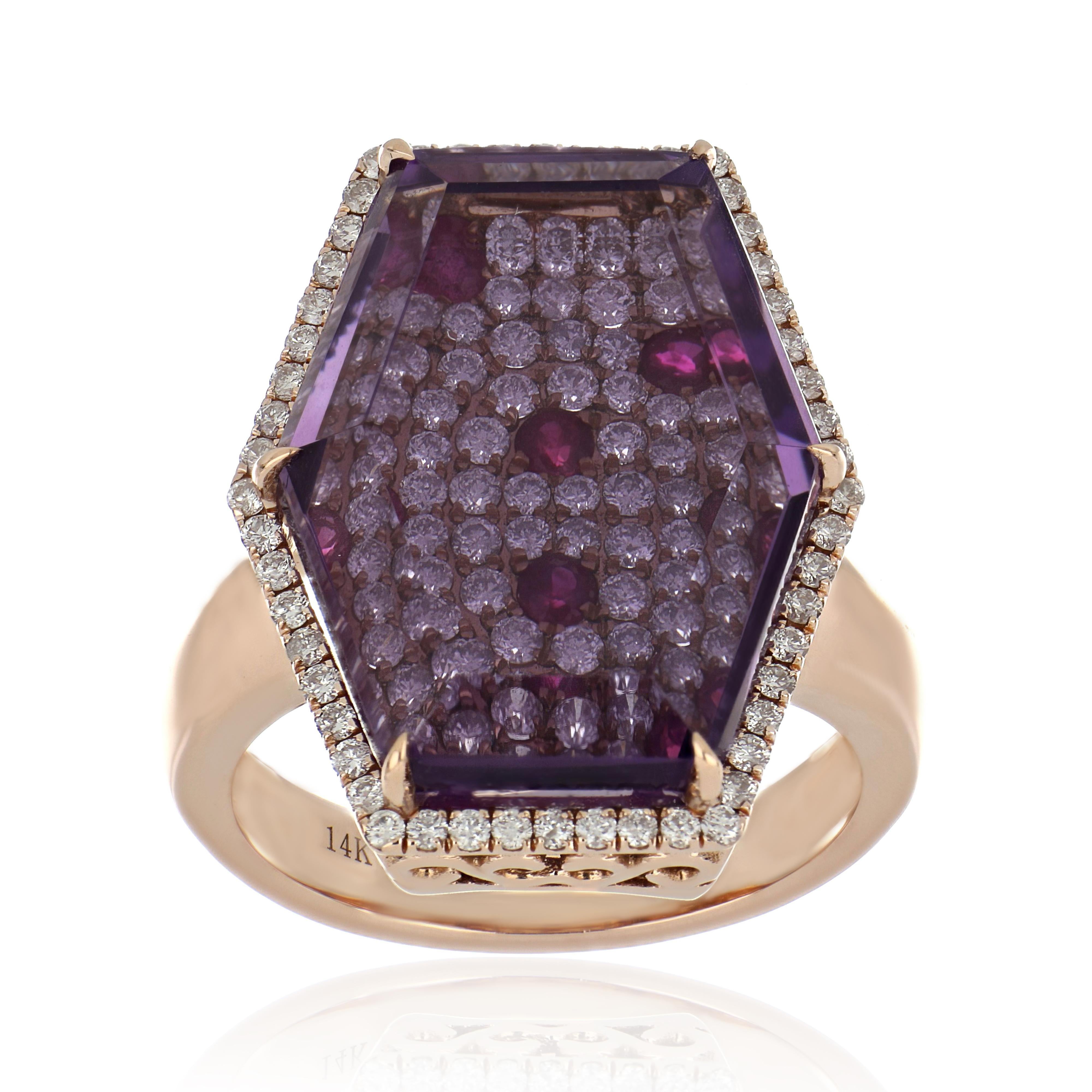 14 Karat Rose Gold ring studded with Hexagon Cut  14.75 Ct  Amethyst,  with unique under stone setting of 0.49 Ct Ruby and 1.02 Cts Diamond Beautifully hand crafted in 14 Karat Rose Gold.

Stone Details:
Amethyst: 20 x 15 mm
Ruby: 2.00 mm

Stone