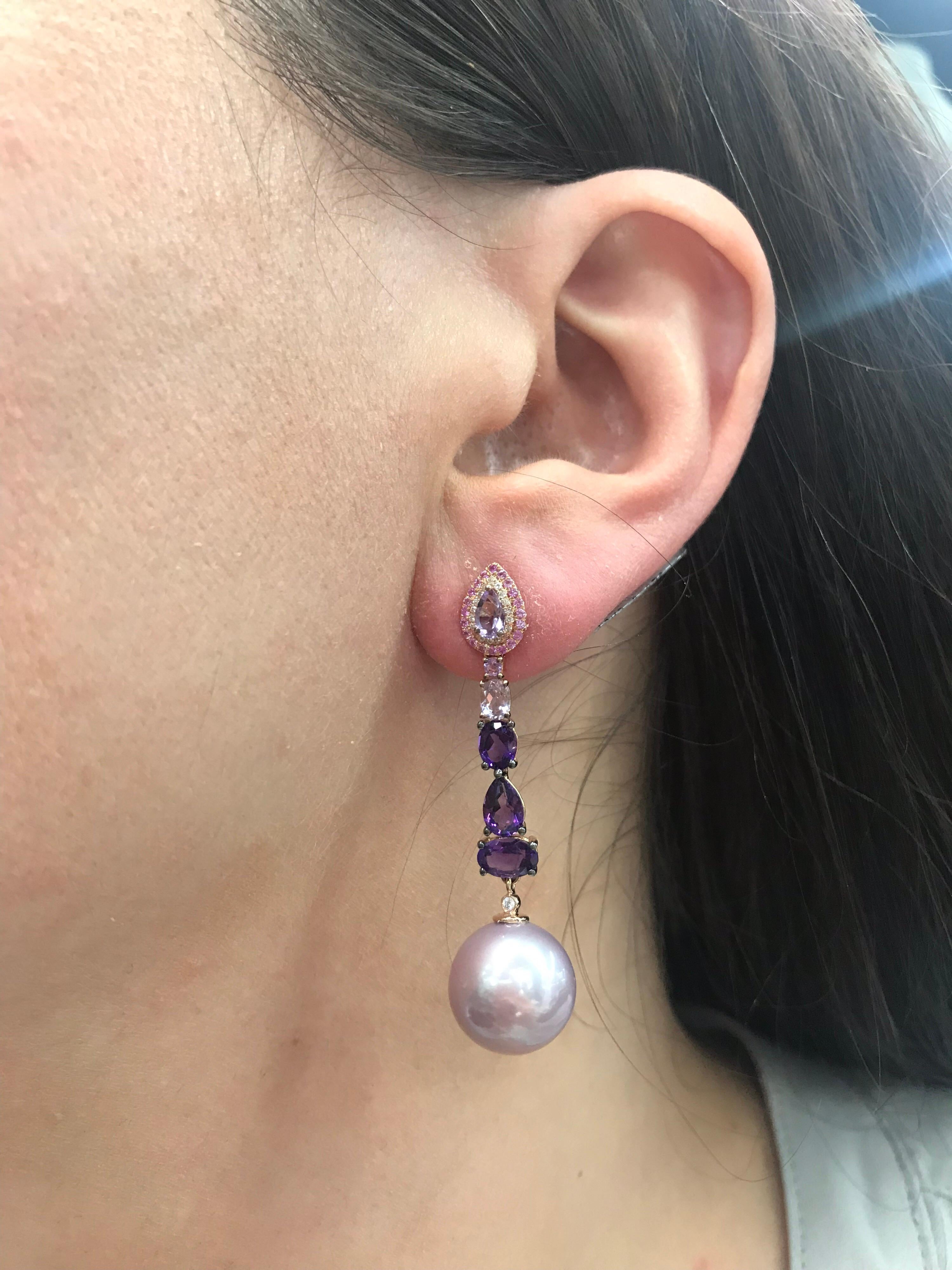 18K Rose gold drop earrings featuring 10 Amethysts, 2.84 carats, Pink Sapphires, 0.08 carats and two Pink Freshwater Pearls measuring 13-14 mm.