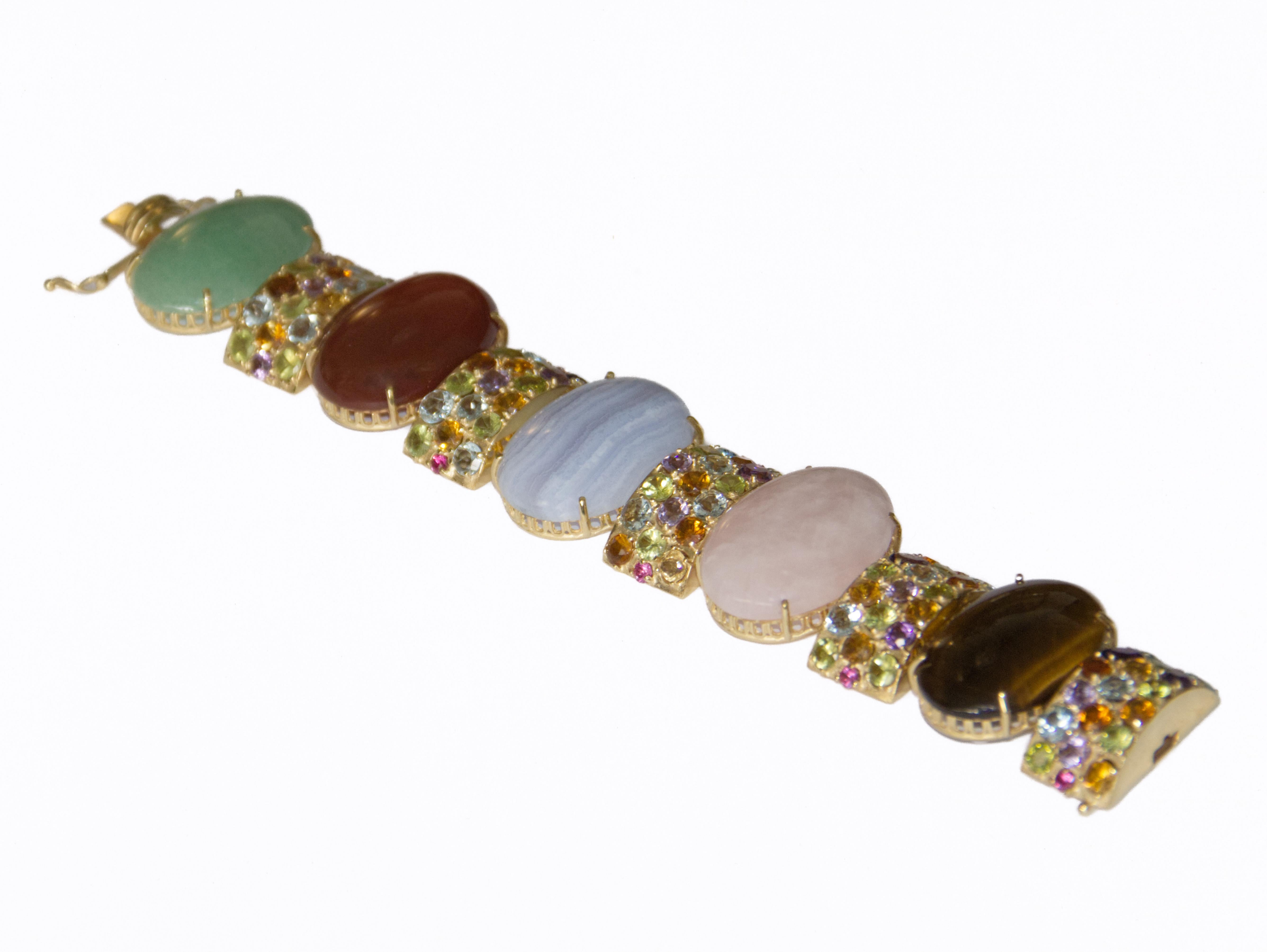 Artisan Amethyst Sapphires Tourmaline Aquamarines 14 Karat Yellow Gold  Cuff Bracelet For Sale