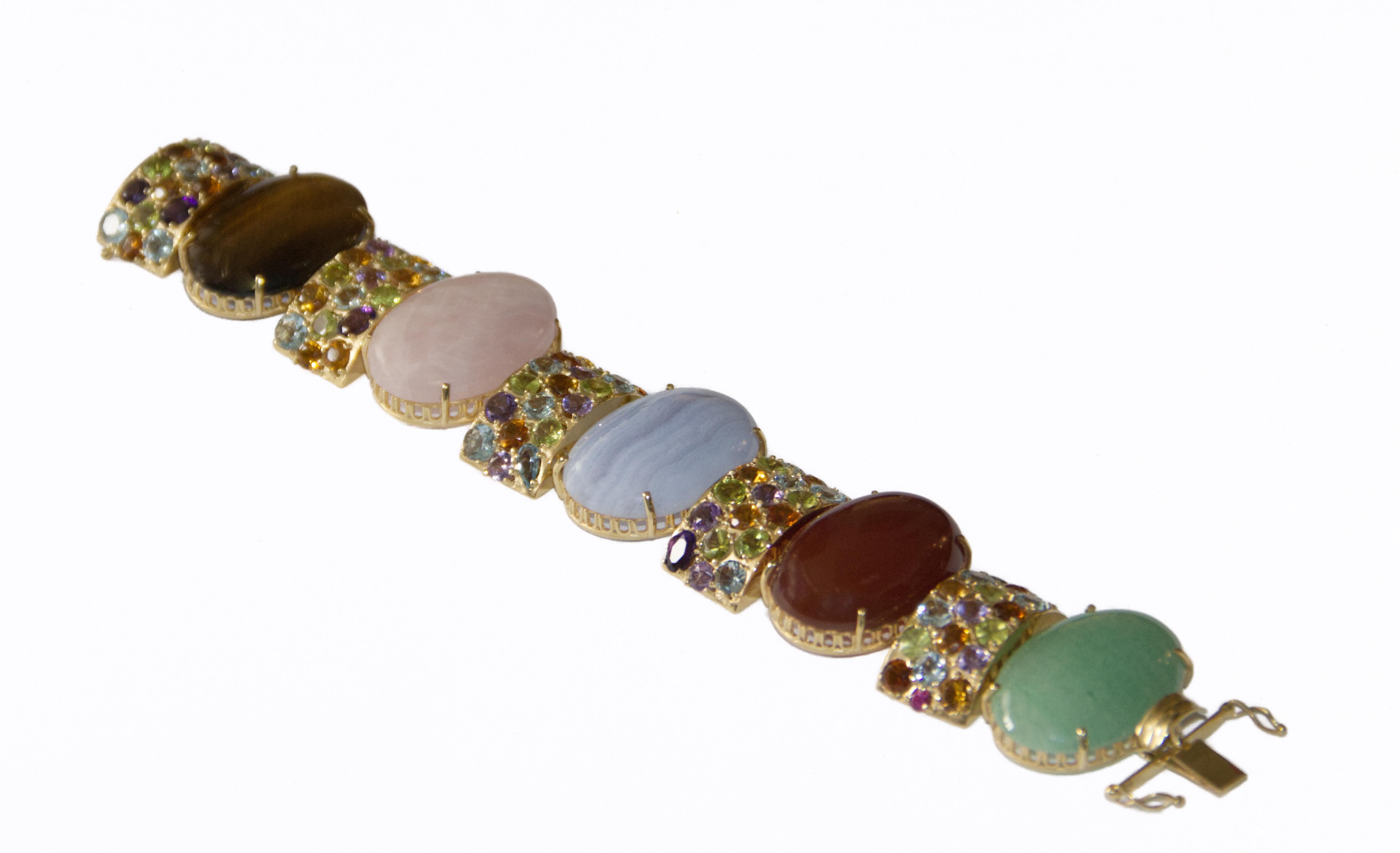 Oval Cut Amethyst Sapphires Tourmaline Aquamarines 14 Karat Yellow Gold  Cuff Bracelet For Sale